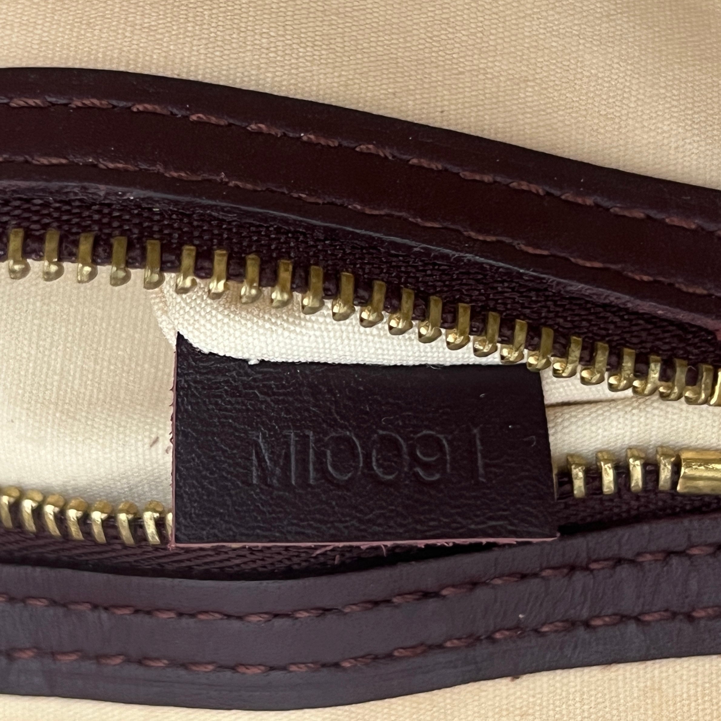 LOUIS VUITTON Alma Long bag in pink canvas and leather