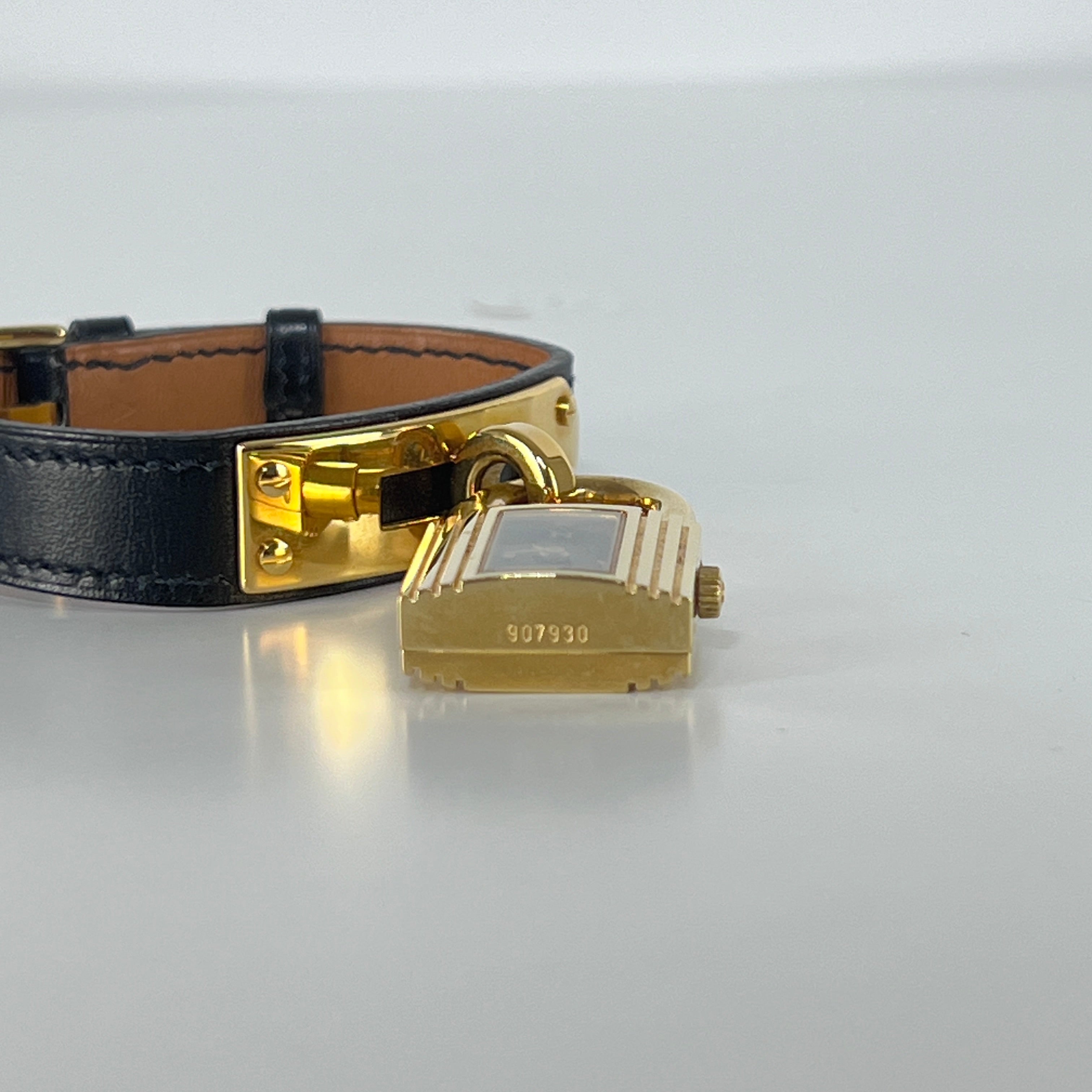 HERMÈS Kelly gold-plated watch