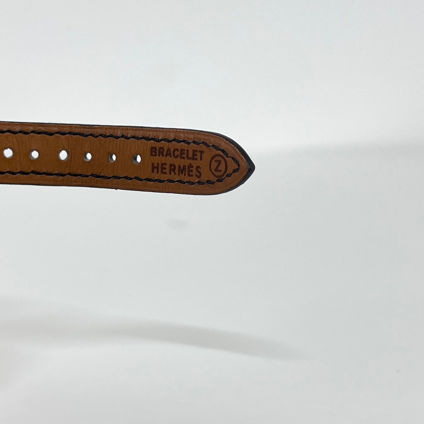 HERMÈS Kelly gold-plated watch