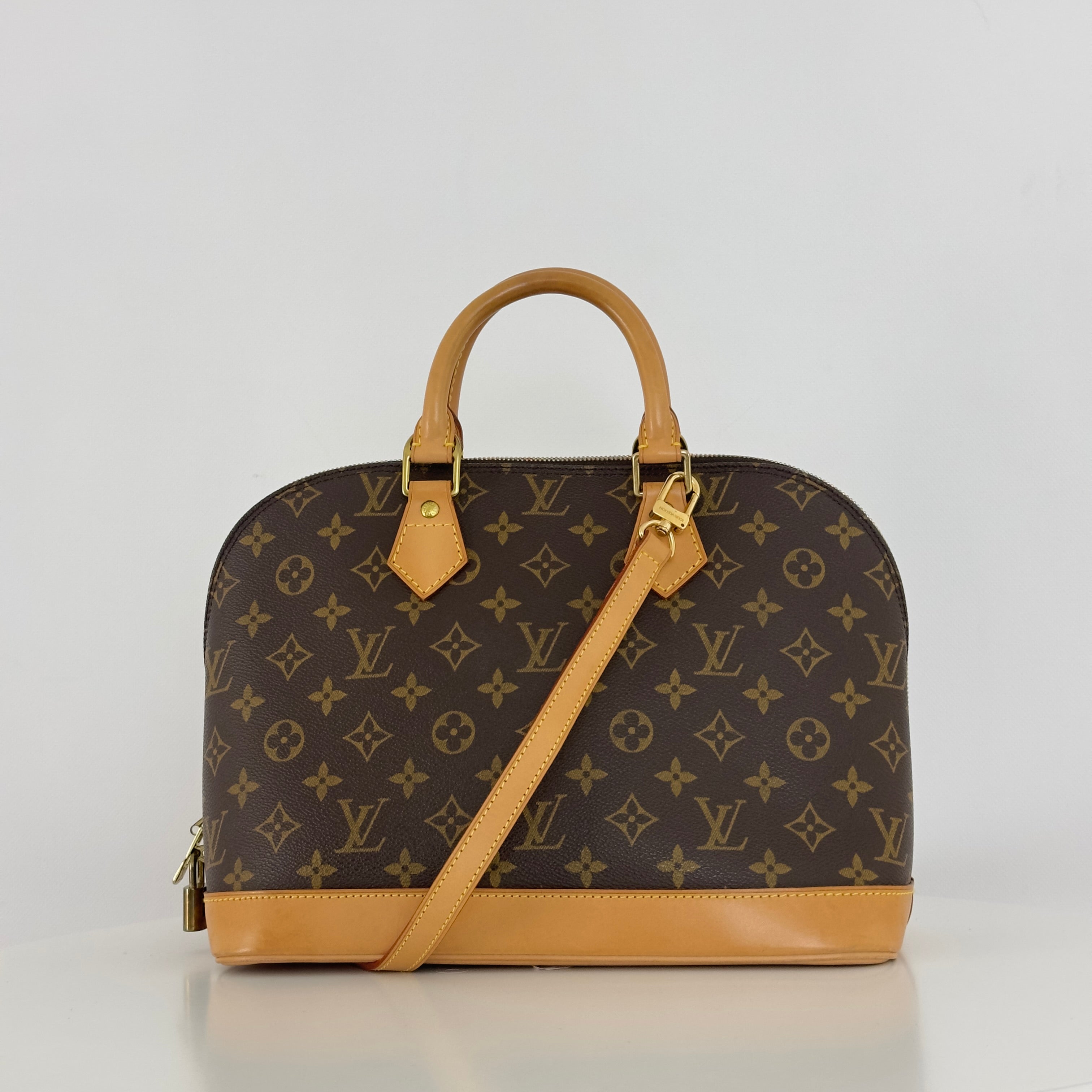 LOUIS VUITTON Alma MM handbag in brown canvas and leather
