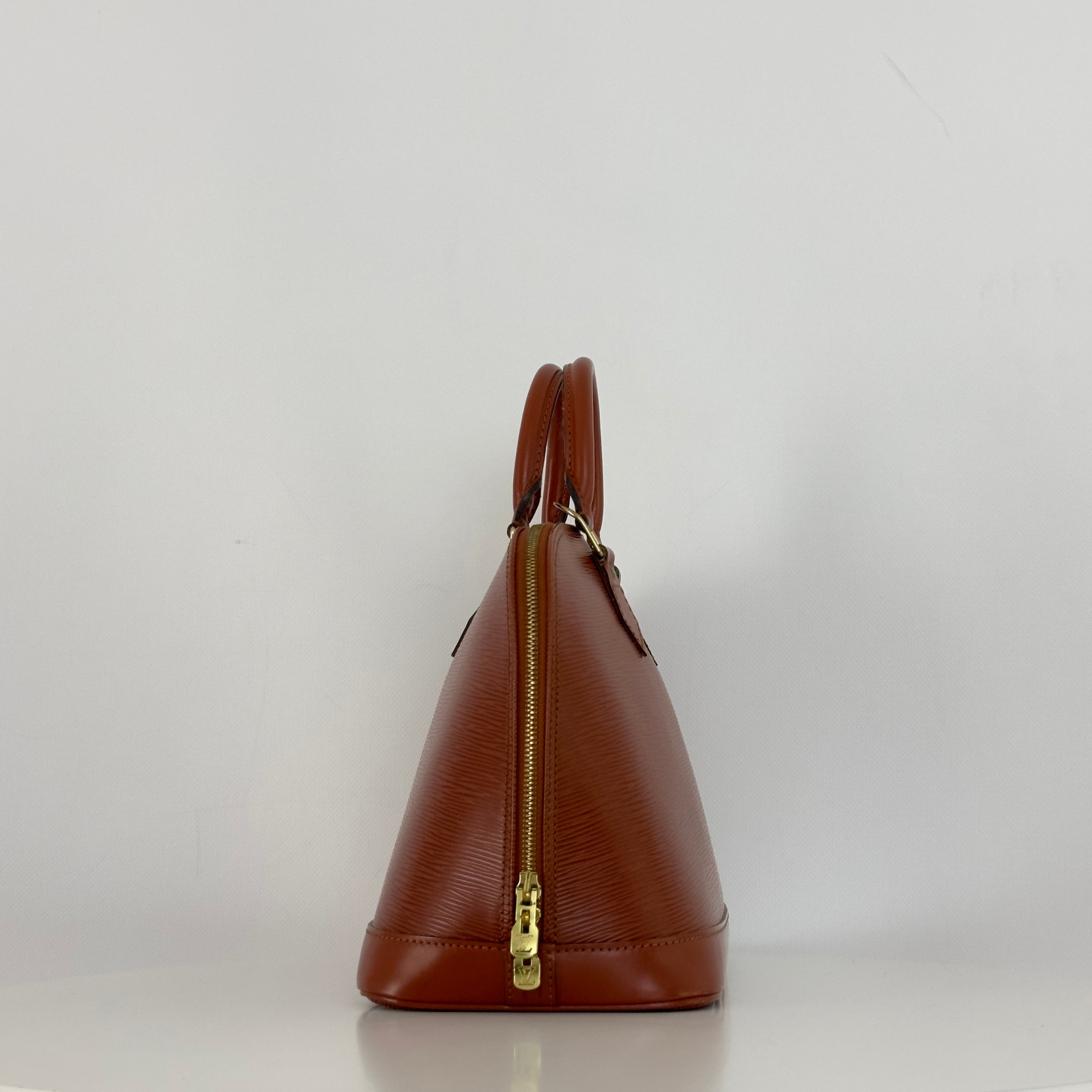 LOUIS VUITTON Alma PM handbag in brown Epi leather