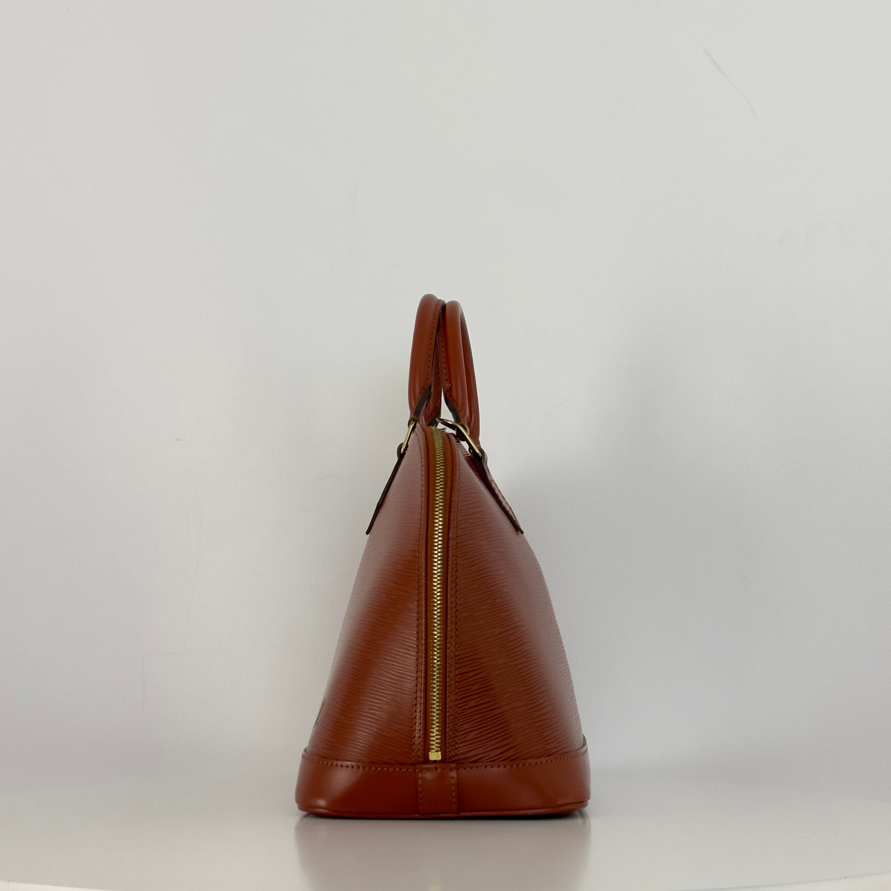 LOUIS VUITTON Alma PM handbag in brown Epi leather