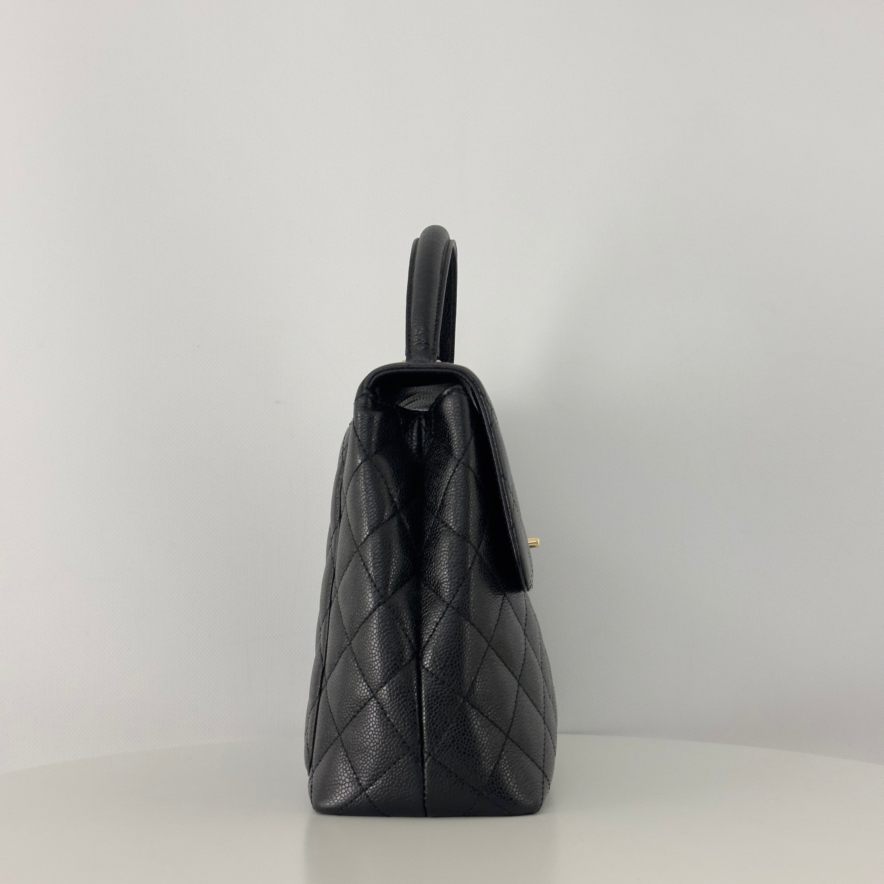 Sac à main CHANEL Top Handle cuir caviar noir