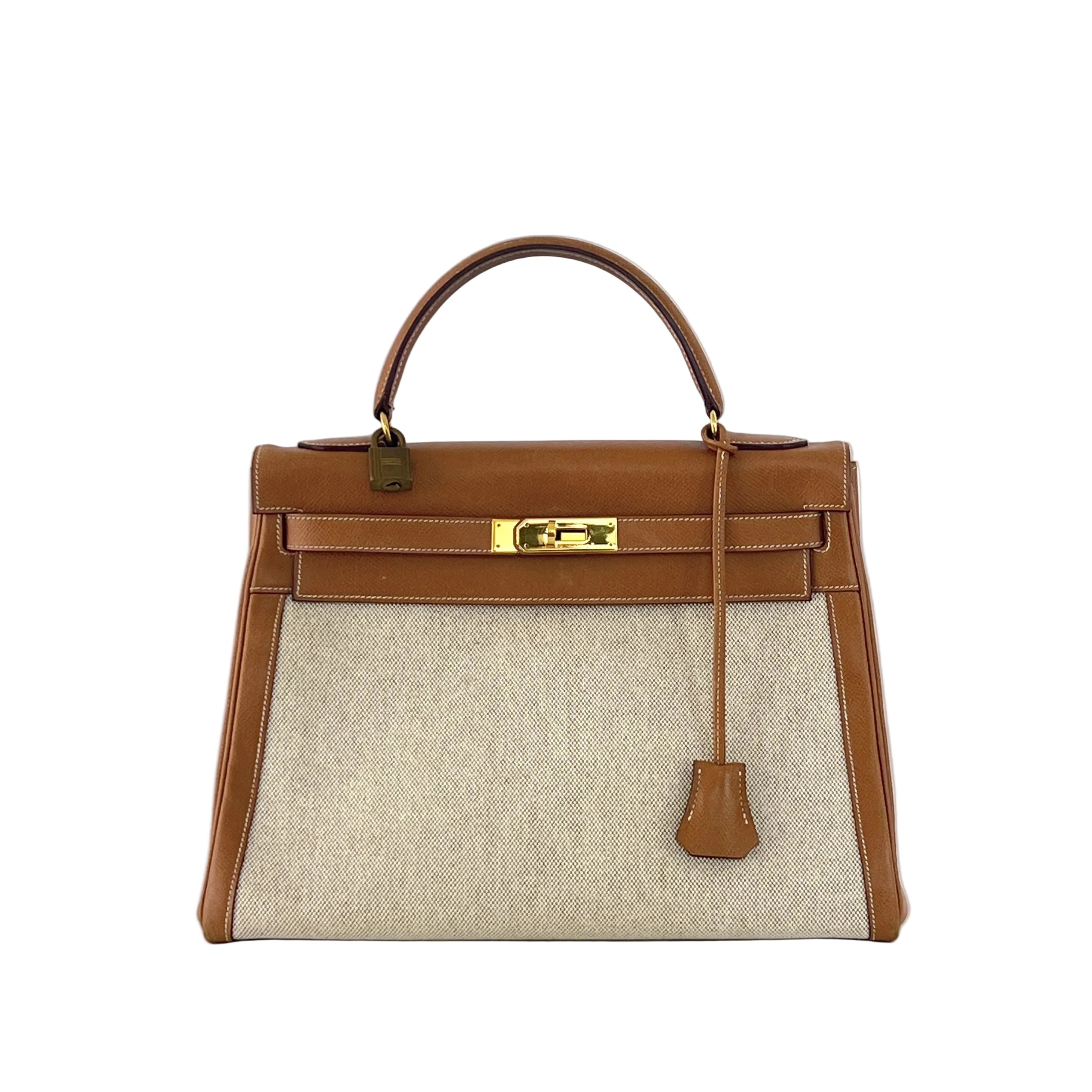 Sac à main HERMÈS Kelly 32 retourné en toile et cuir Gold Courchevel