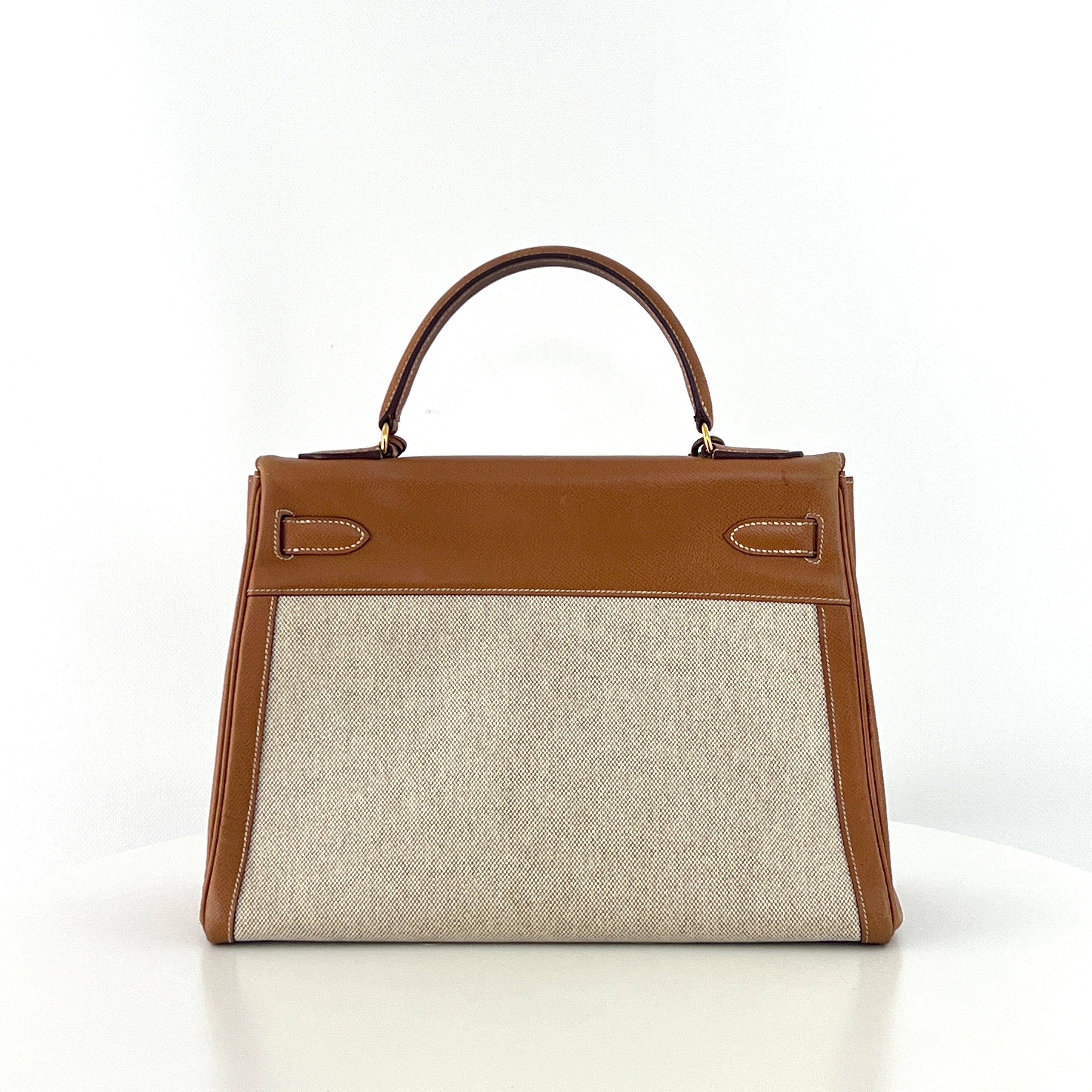 Sac à main HERMÈS Kelly 32 retourné en toile et cuir Gold Courchevel