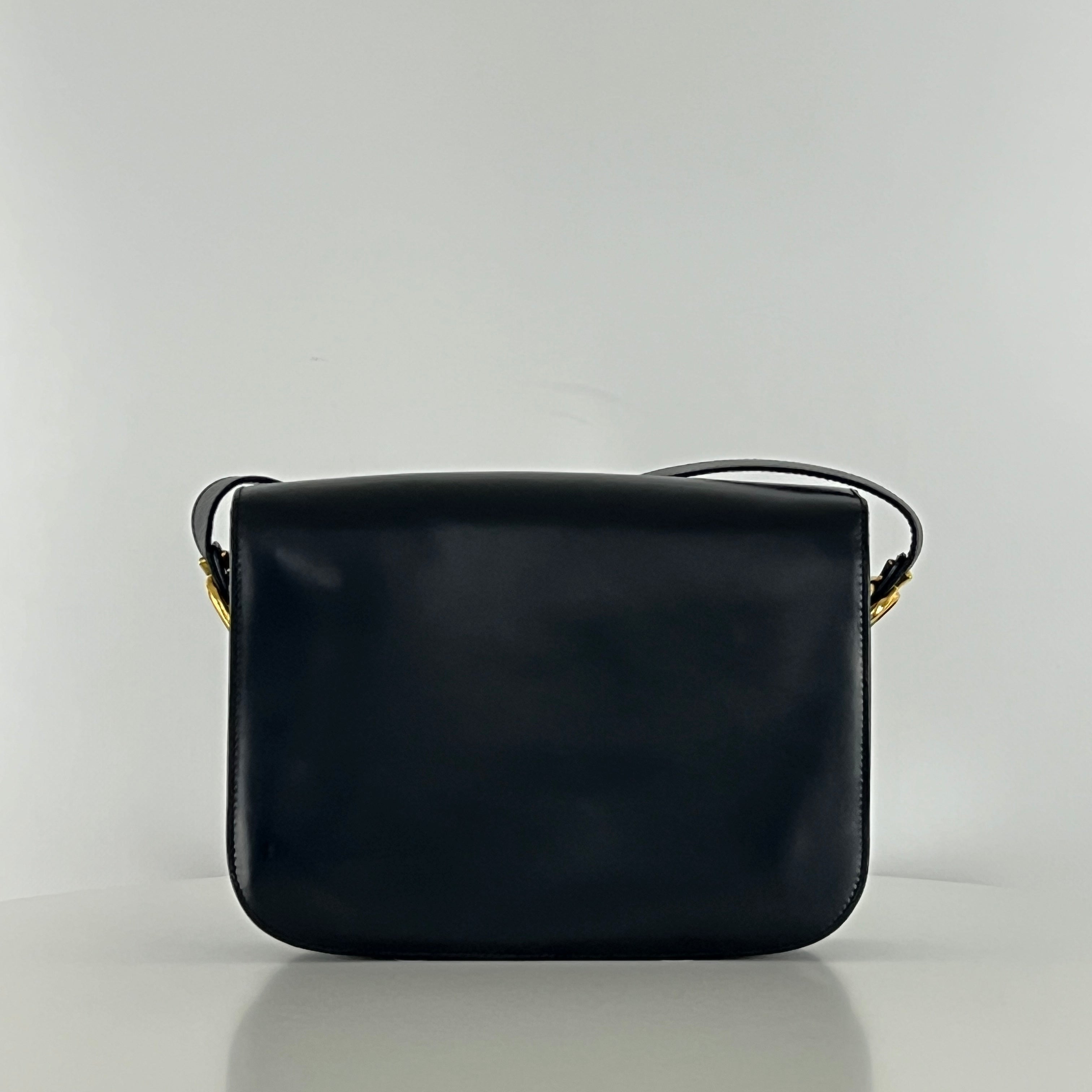 Sac à main CELINE Triomphe cuir noir