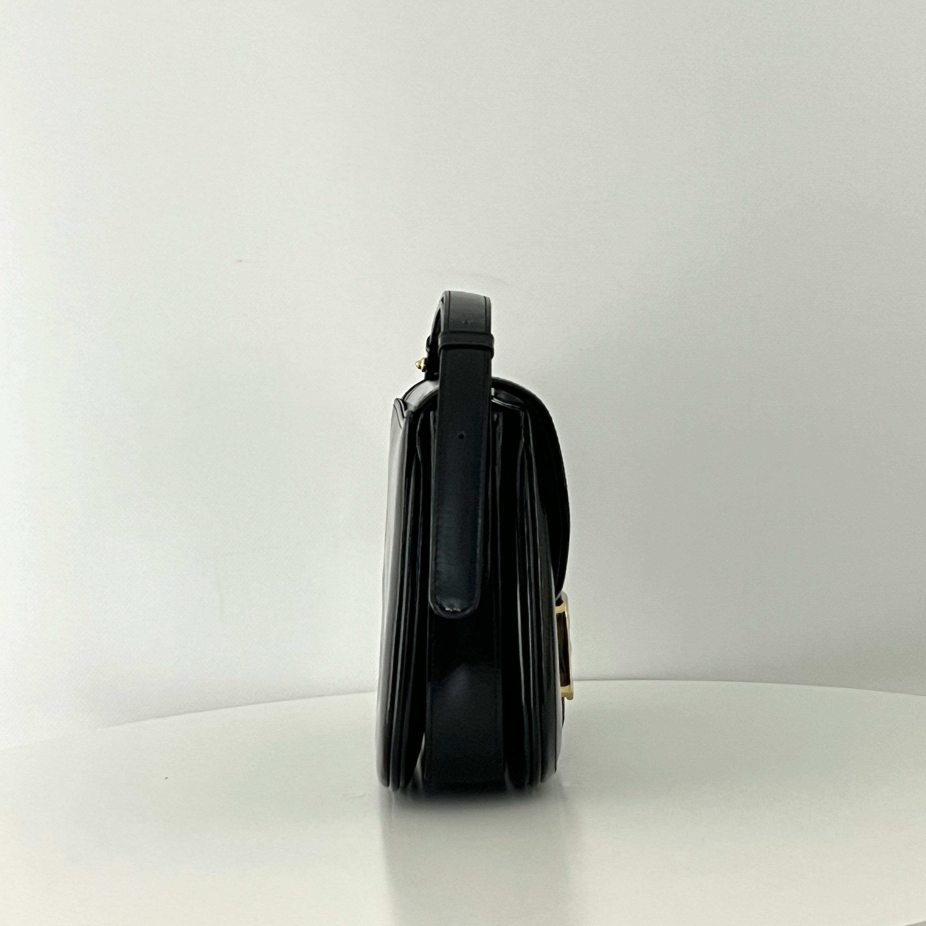 Sac à main CELINE Triomphe cuir noir