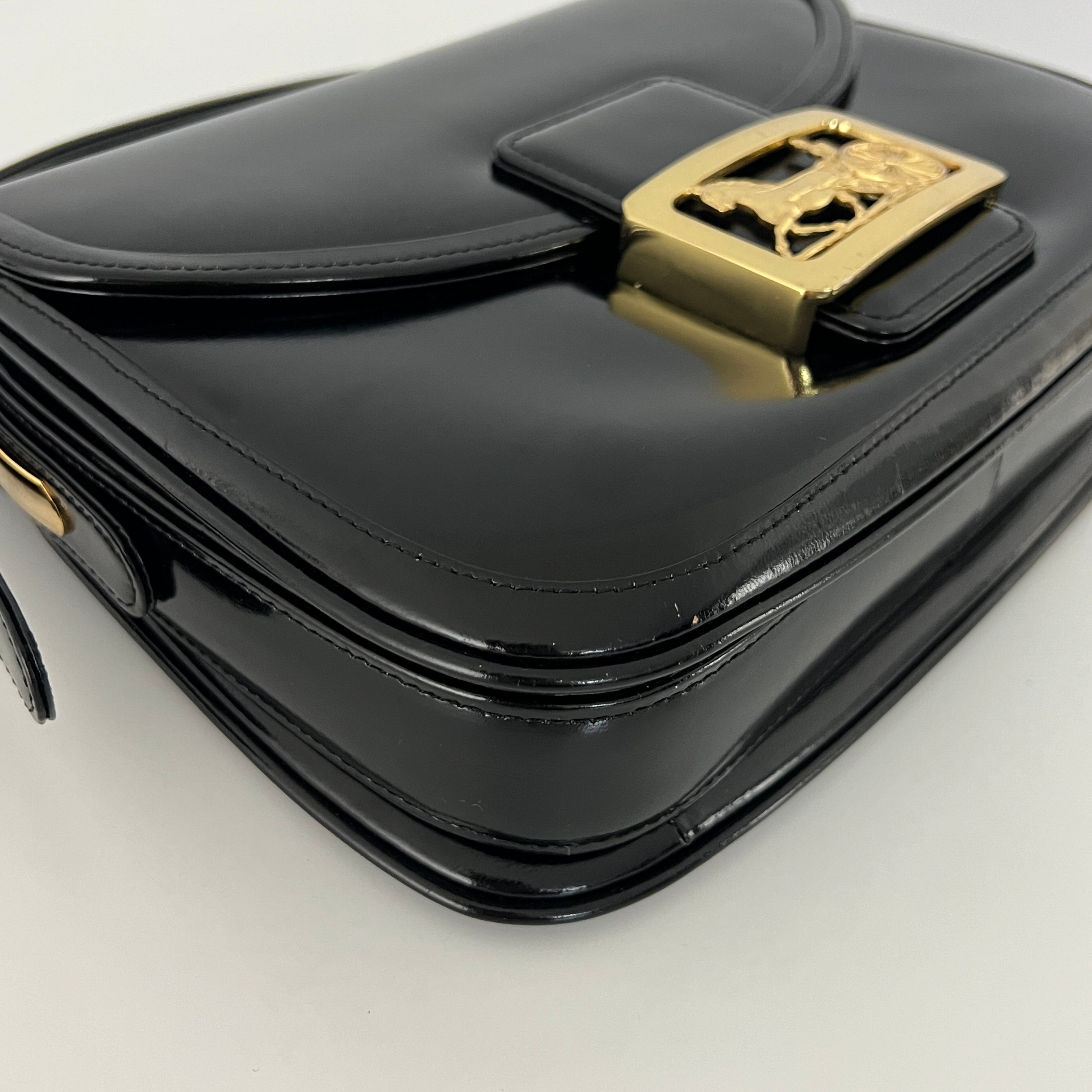 Sac à main CELINE Triomphe cuir noir