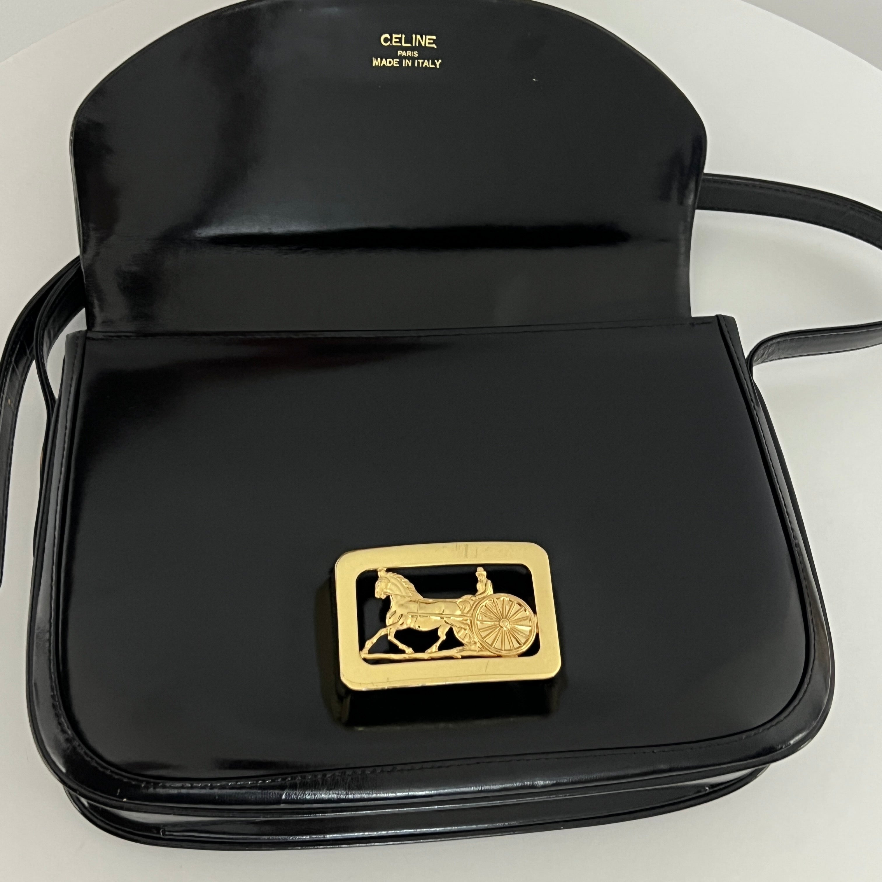 Sac à main CELINE Triomphe cuir noir