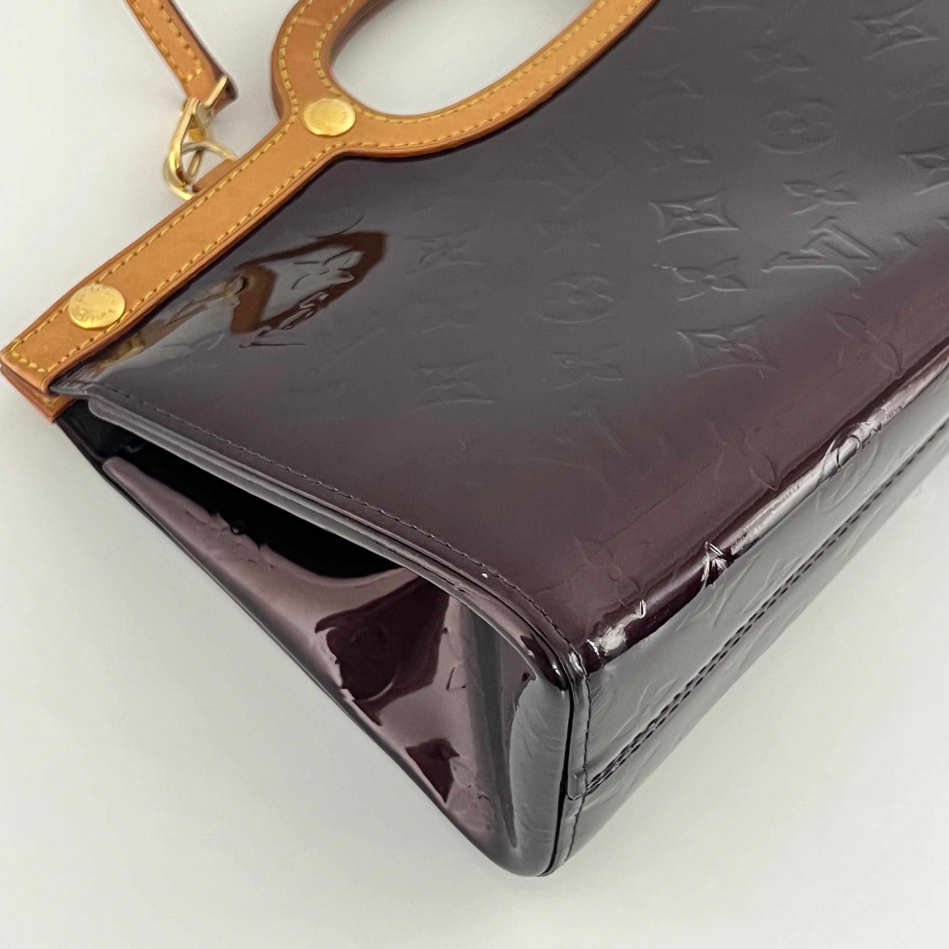 LOUIS VUITTON Roxbury handbag in purple patent leather