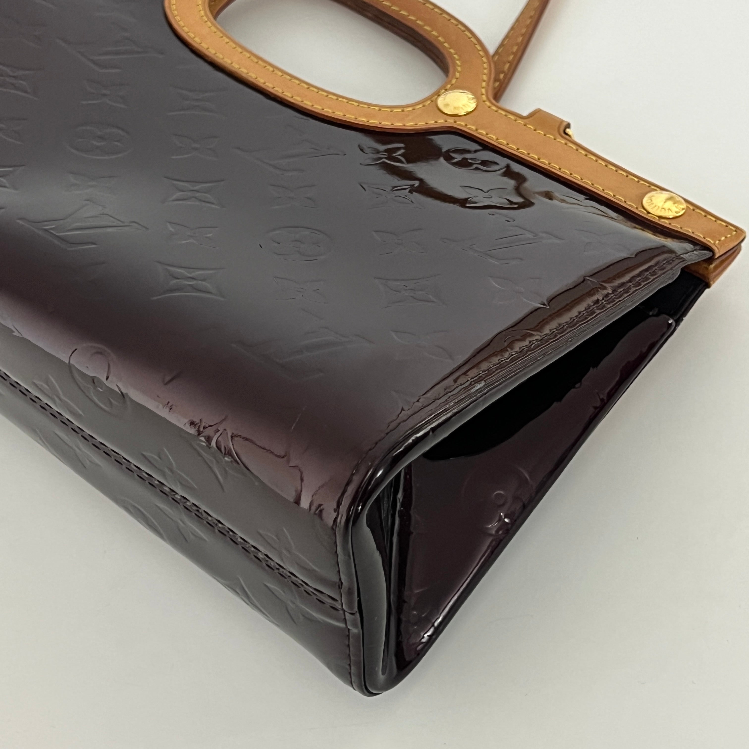 LOUIS VUITTON Roxbury handbag in purple patent leather