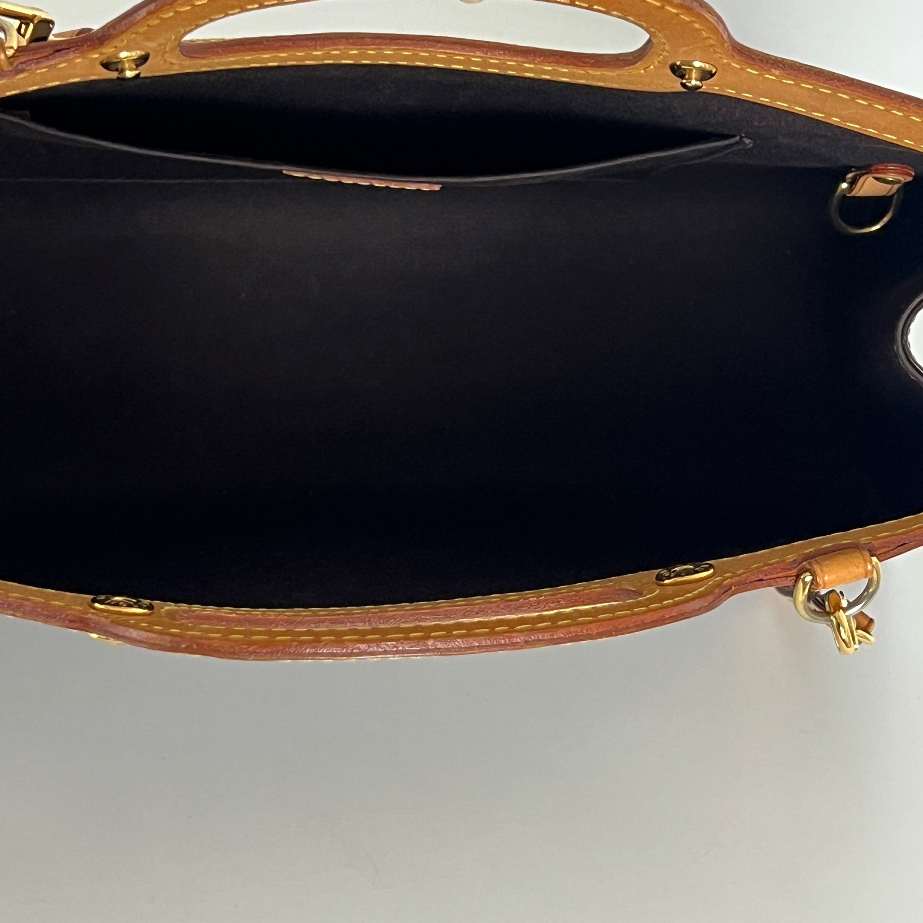 LOUIS VUITTON Roxbury handbag in purple patent leather