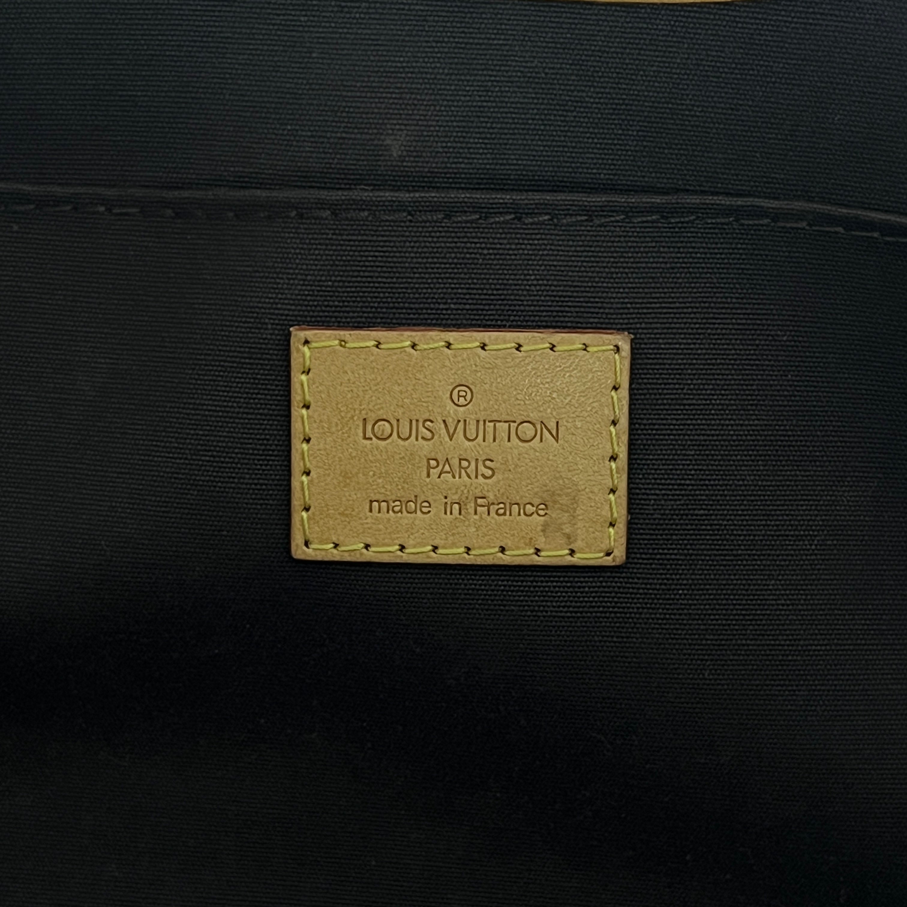 LOUIS VUITTON Roxbury handbag in purple patent leather