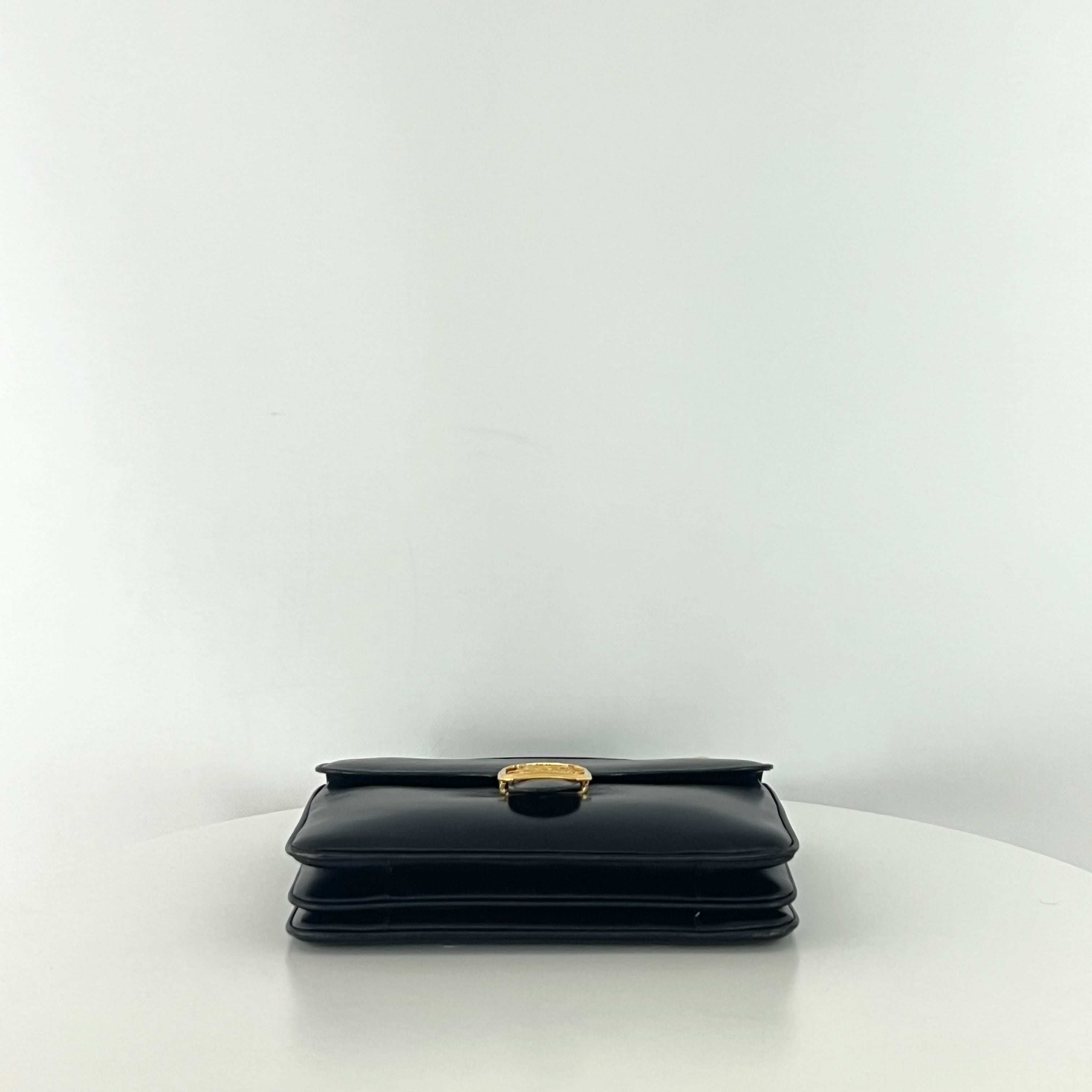 Sac à main CELINE Triomphe cuir noir