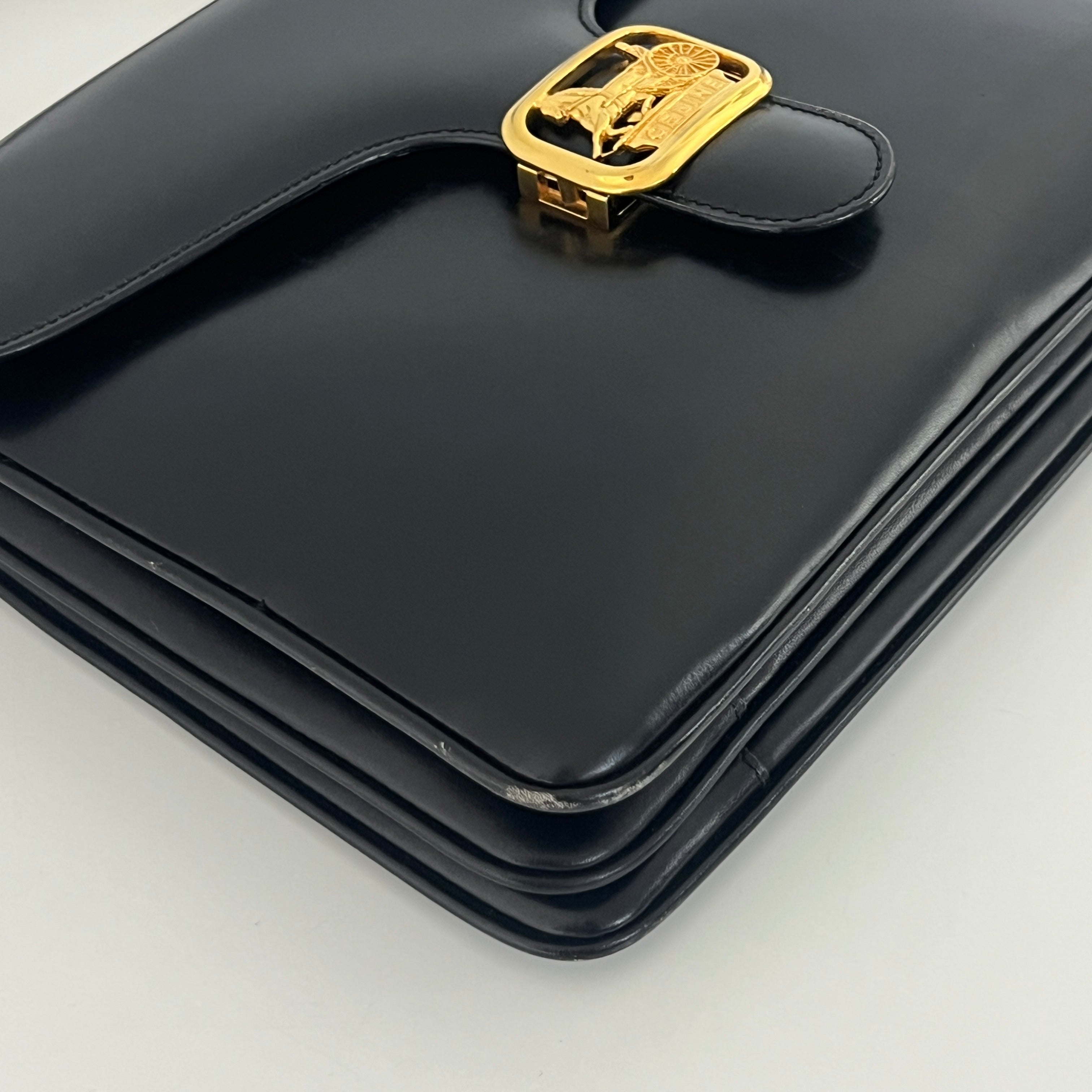 Sac à main CELINE Triomphe cuir noir