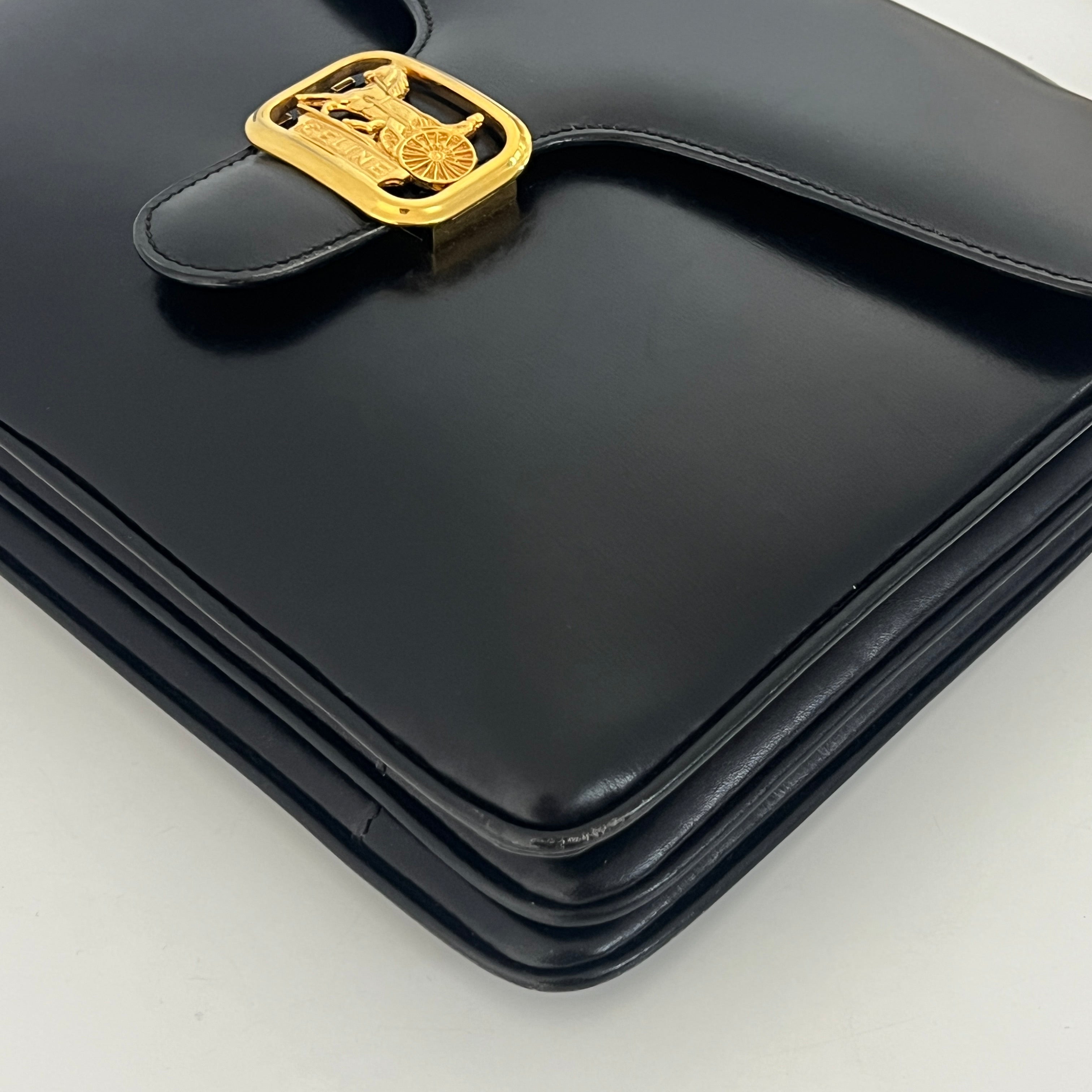 Sac à main CELINE Triomphe cuir noir