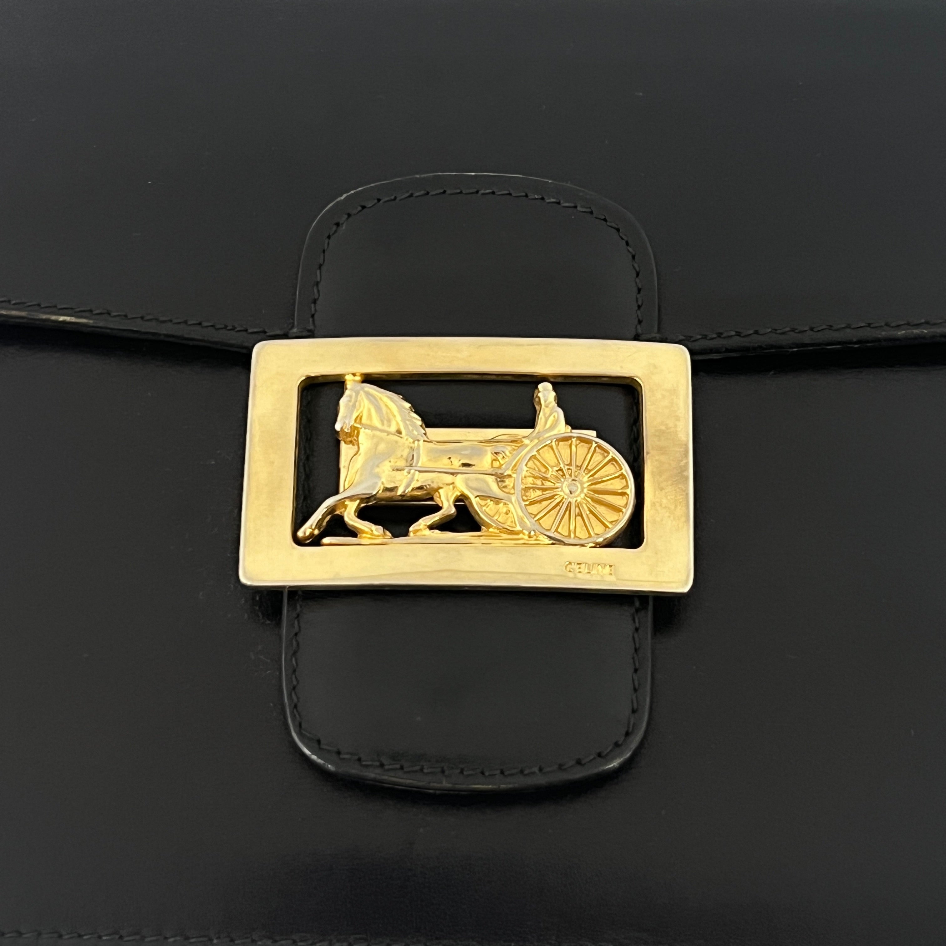 Sac à main CELINE Triomphe cuir noir