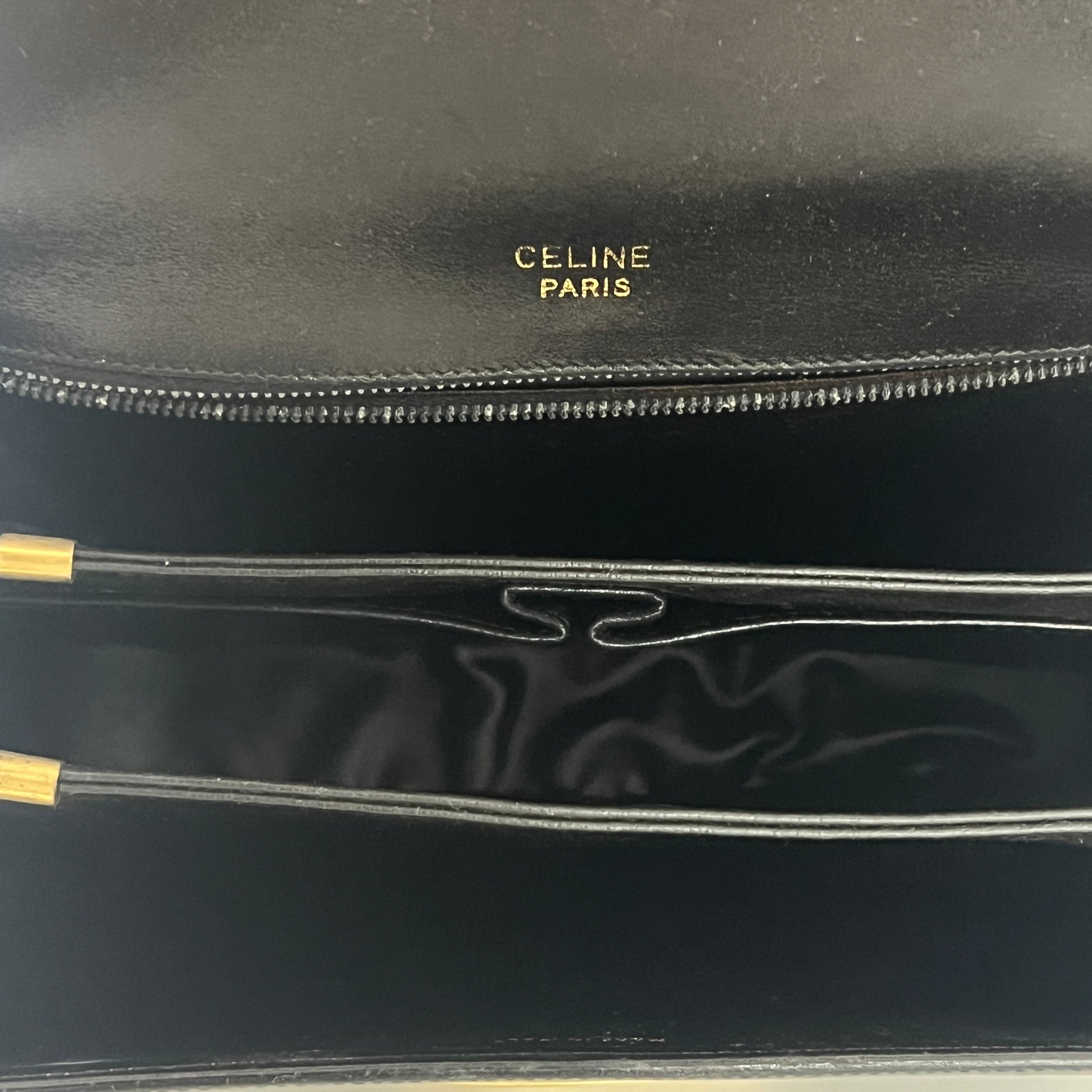 Sac à main CELINE Triomphe cuir noir