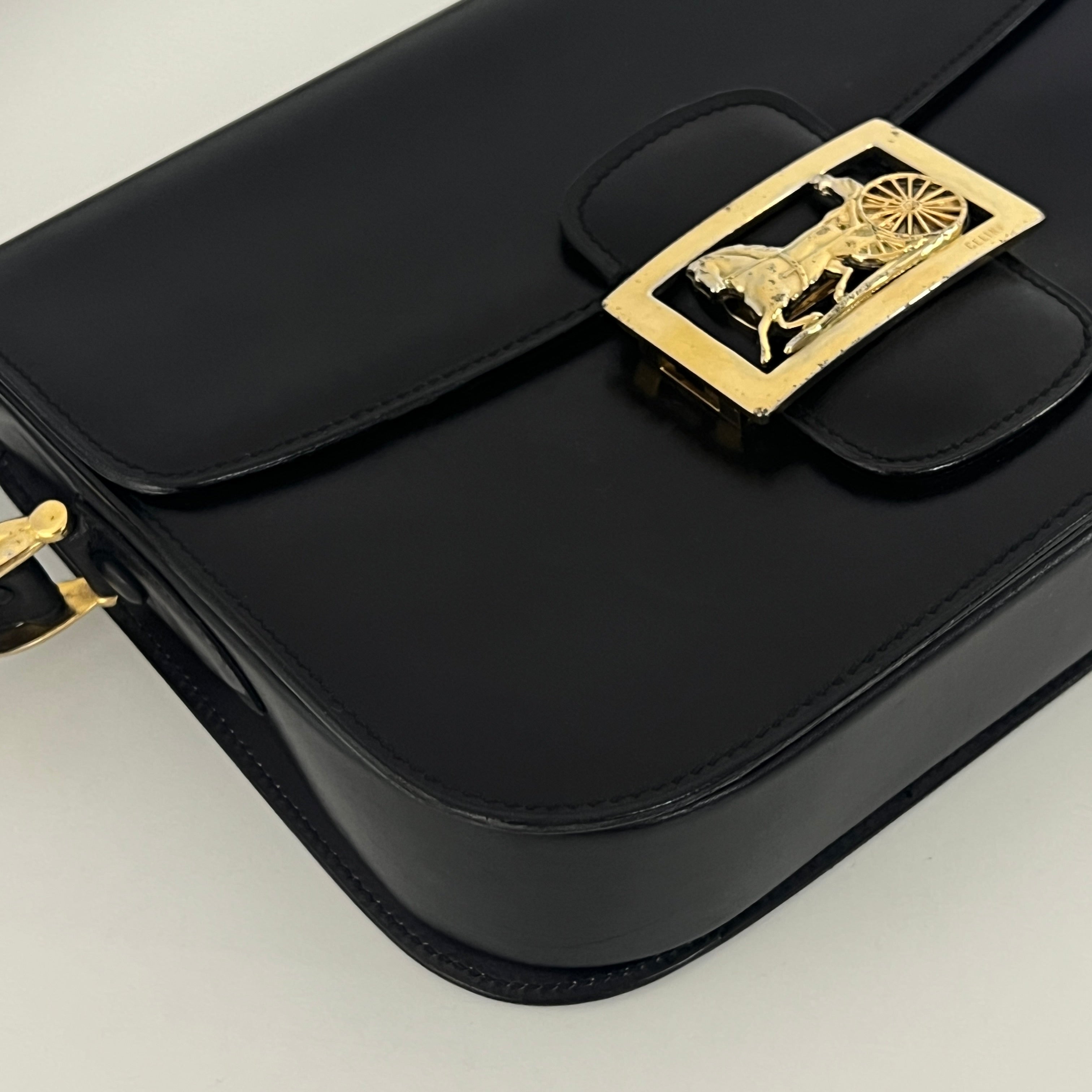 Sac à main CELINE Triomphe cuir noir