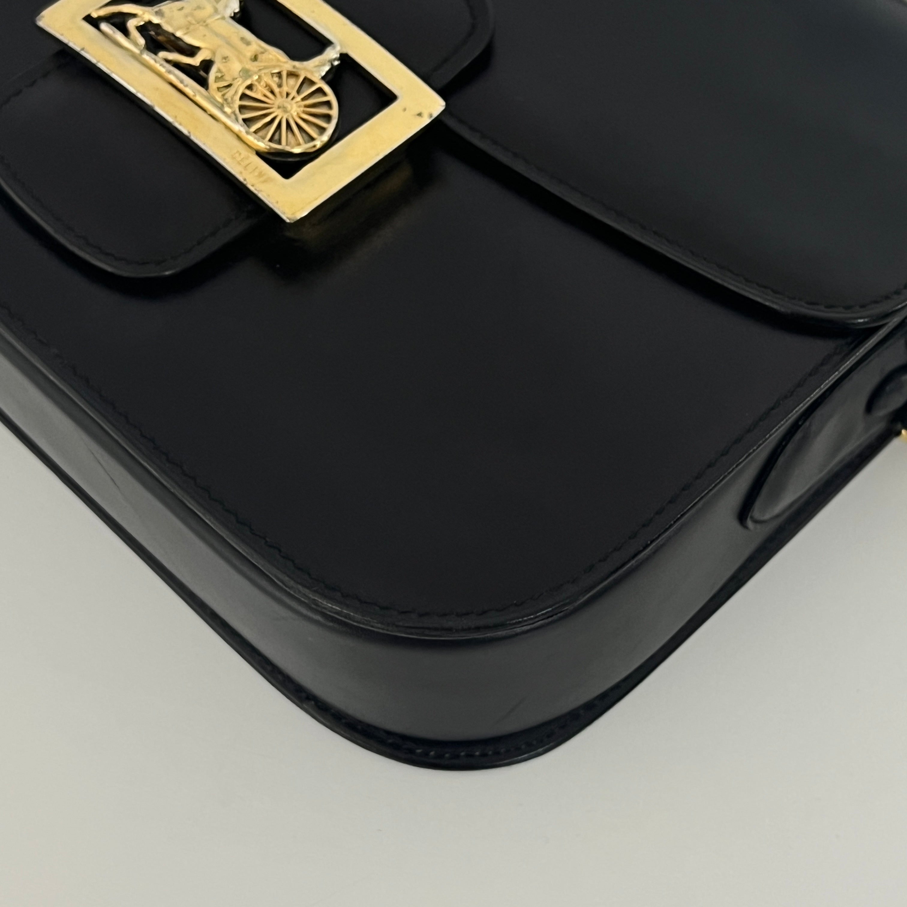 Sac à main CELINE Triomphe cuir noir