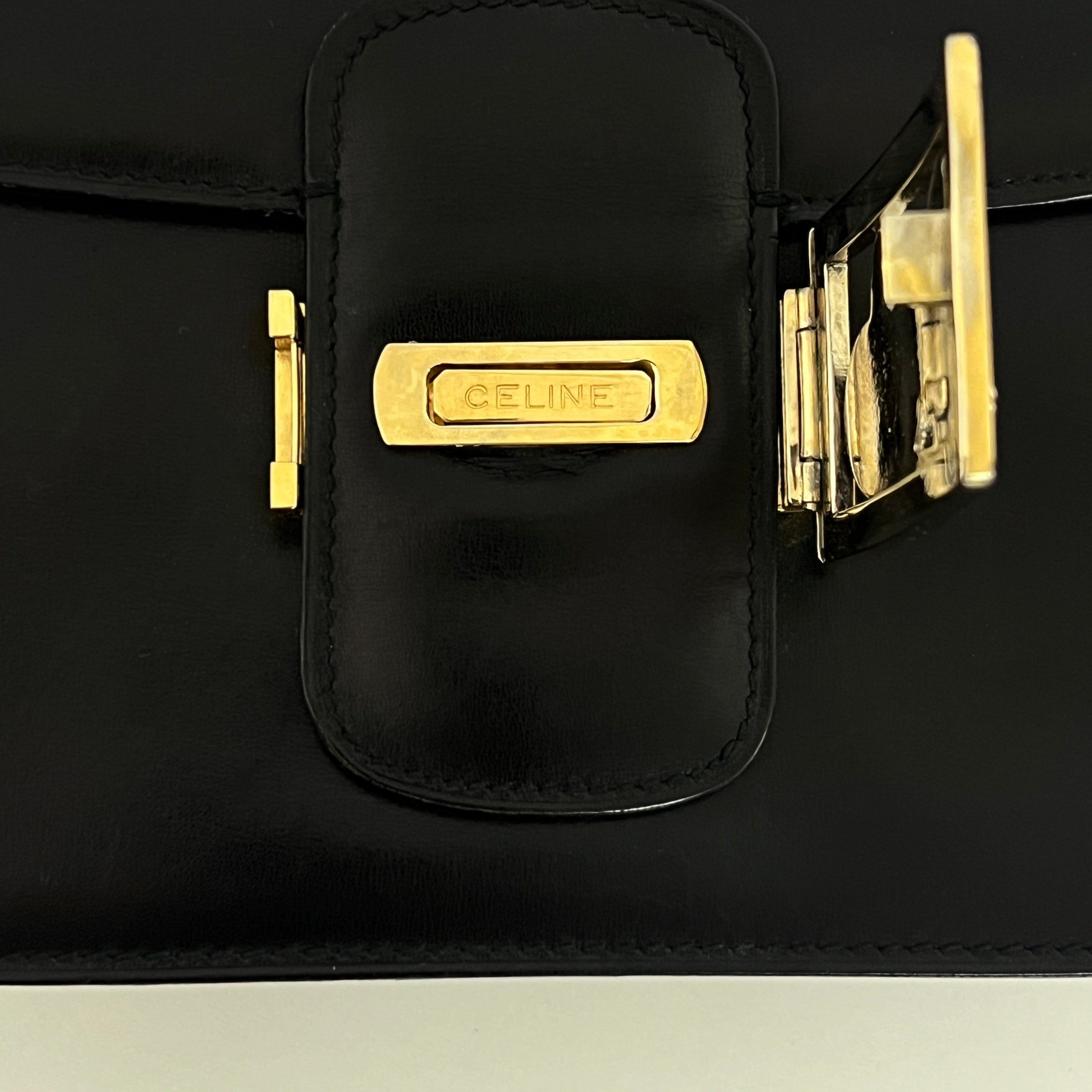 Sac à main CELINE Triomphe cuir noir