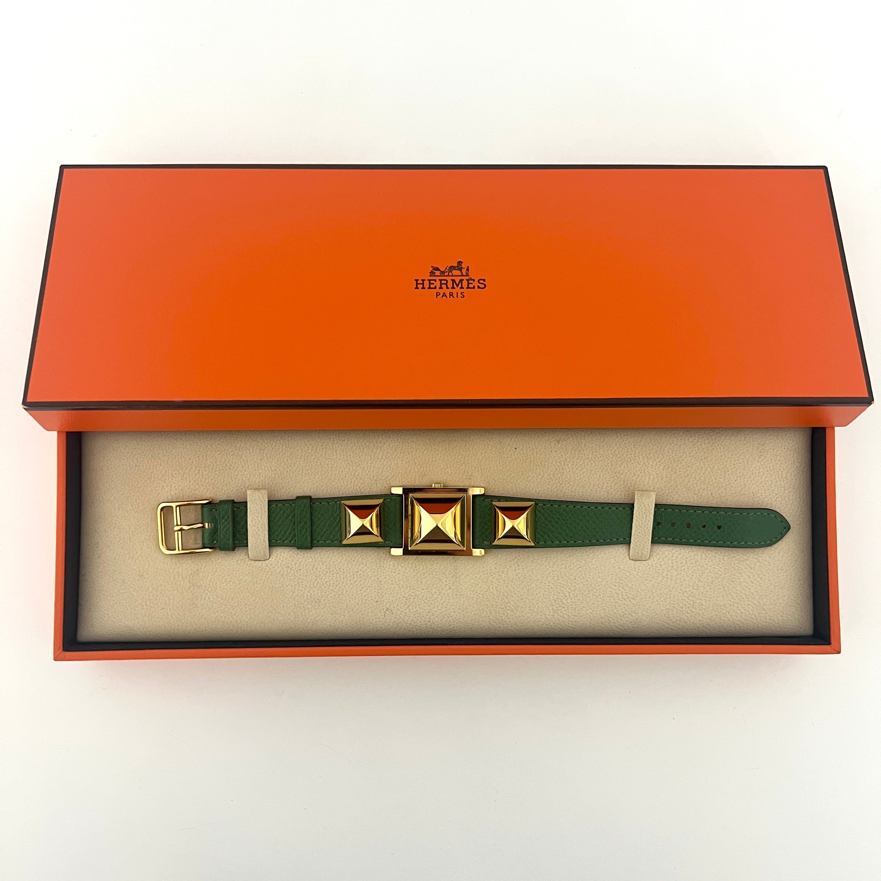 Montre HERMÈS Médor plaquée or dorée