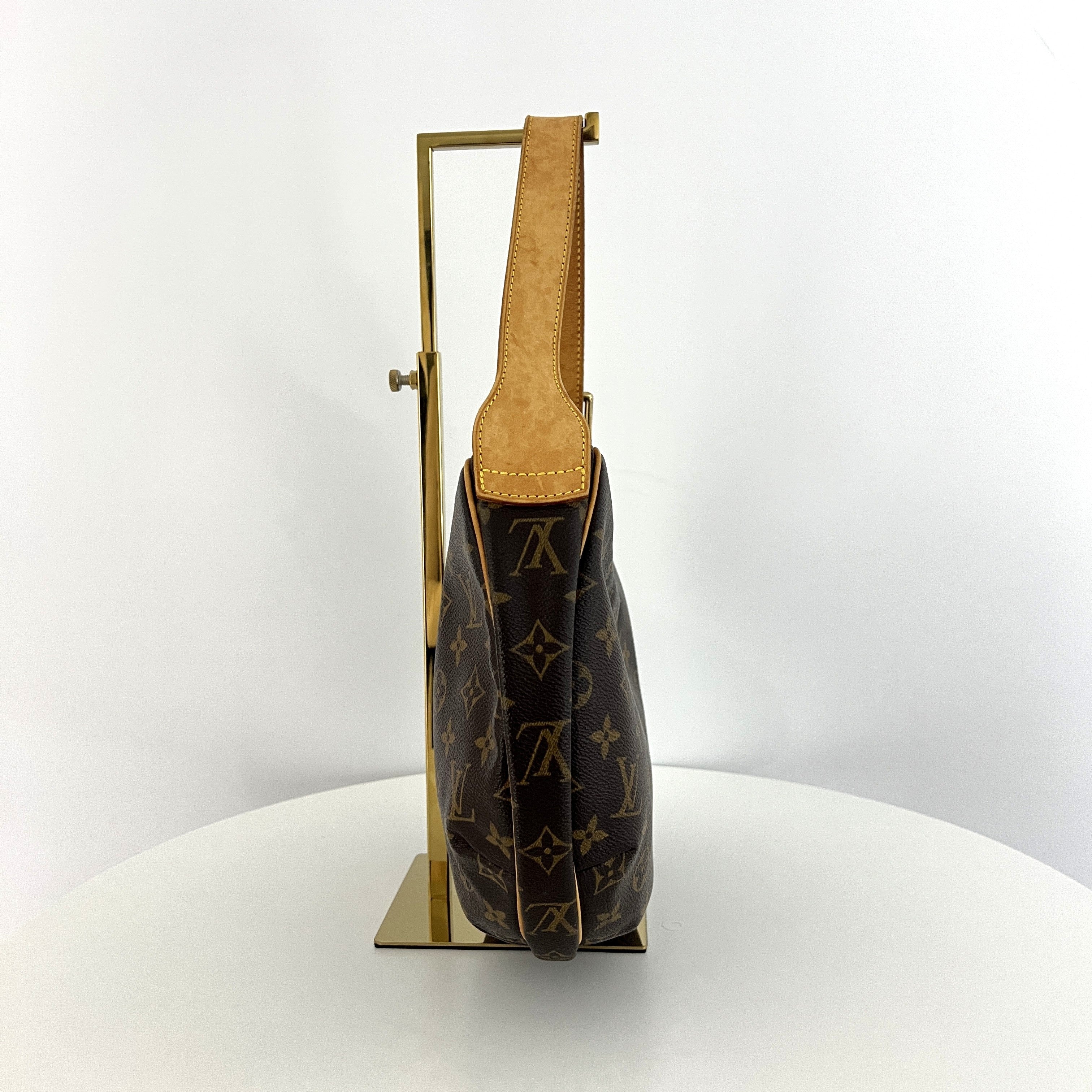 LOUIS VUITTON Croissant MM handbag in brown canvas and leather