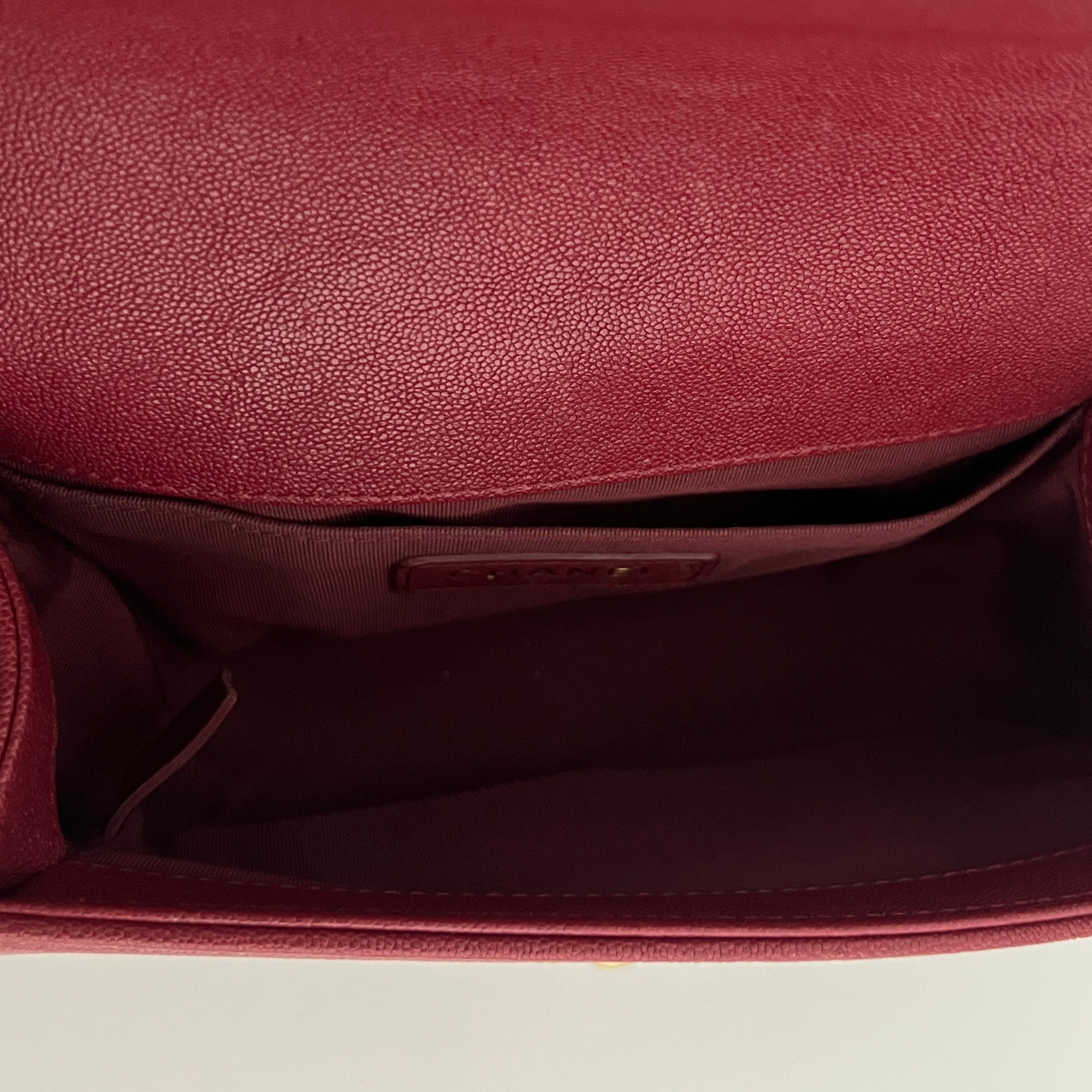 CHANEL Boy Chevron handbag in red caviar leather