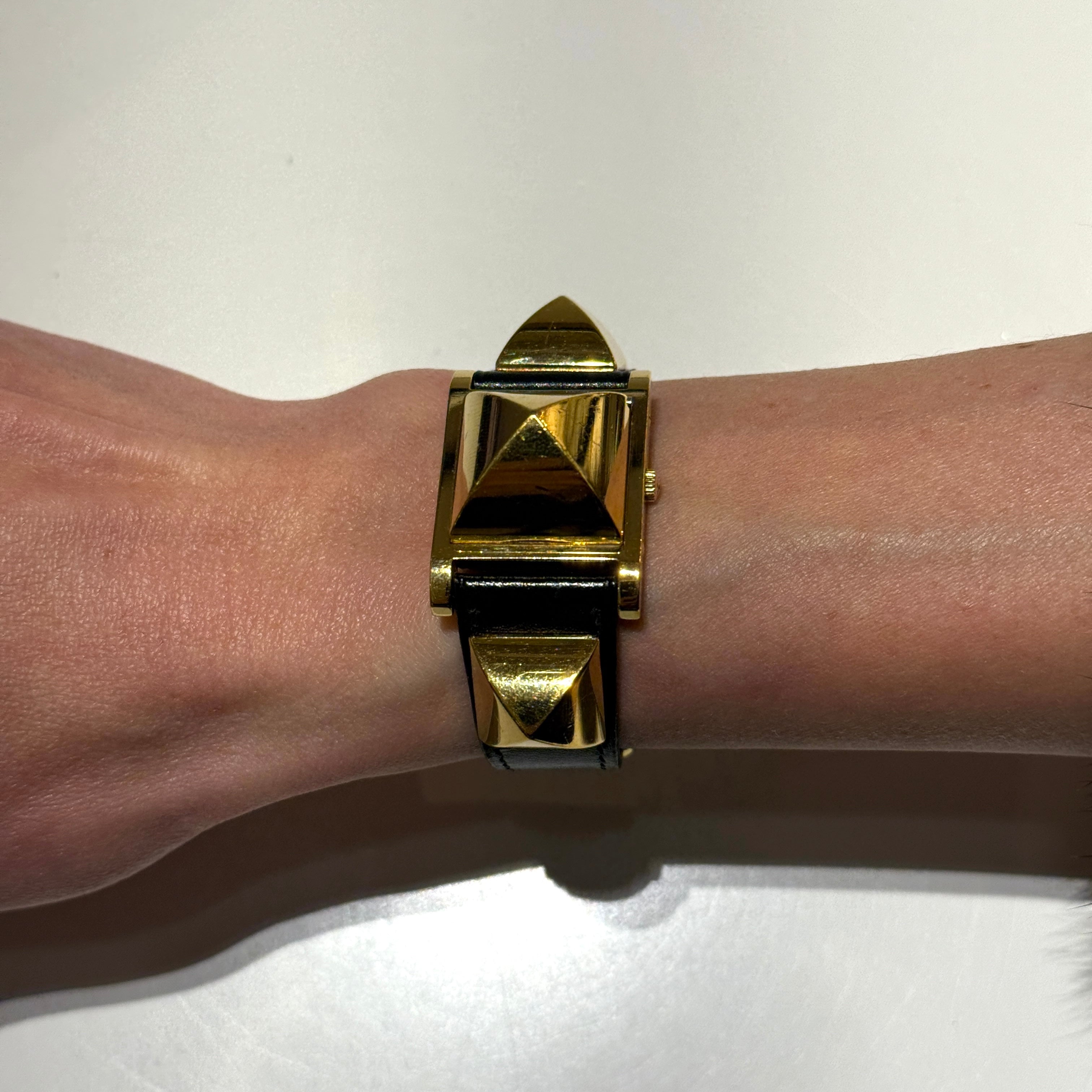 Montre HERMÈS Médor plaquée or dorée