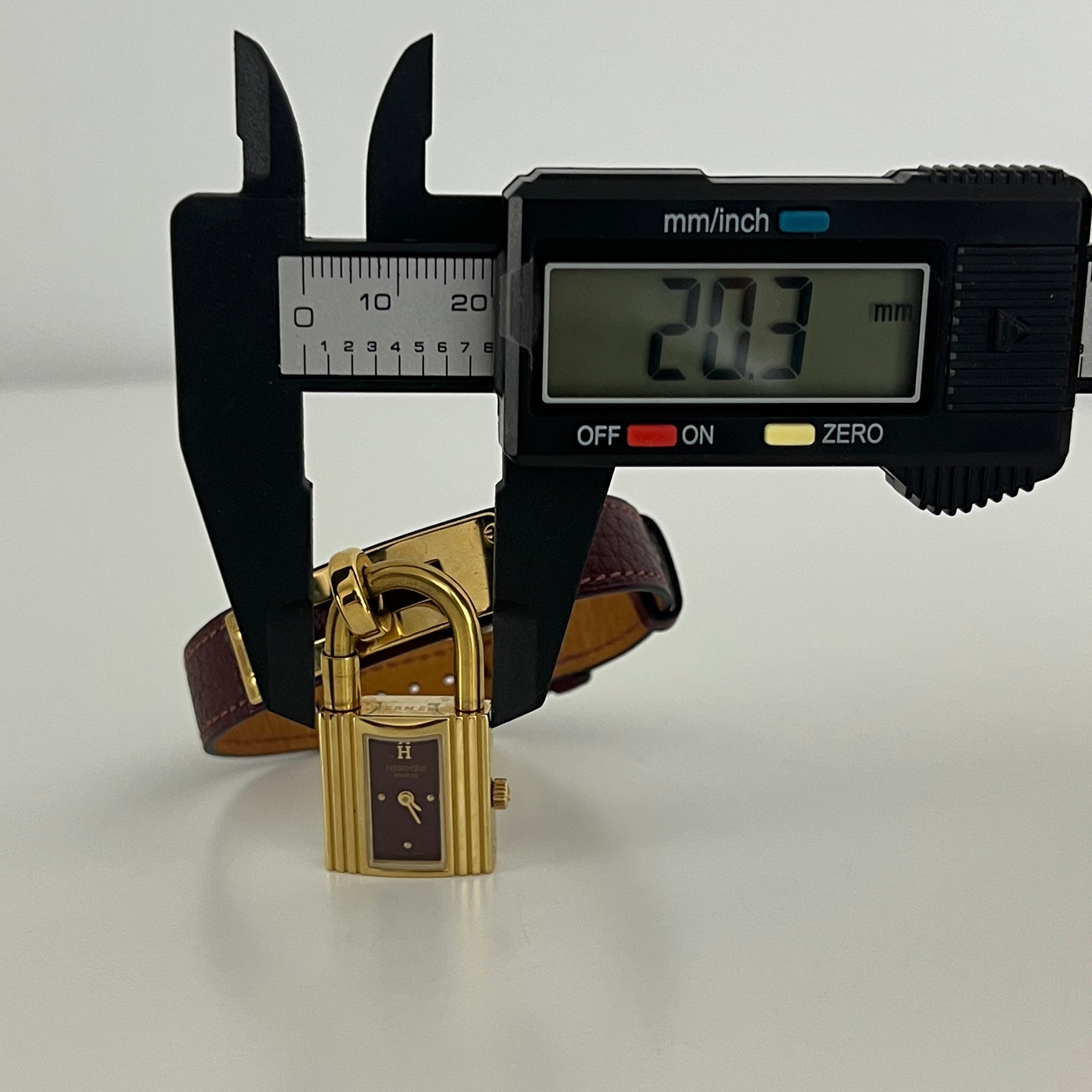 Montre HERMÈS Kelly plaquée or dorée