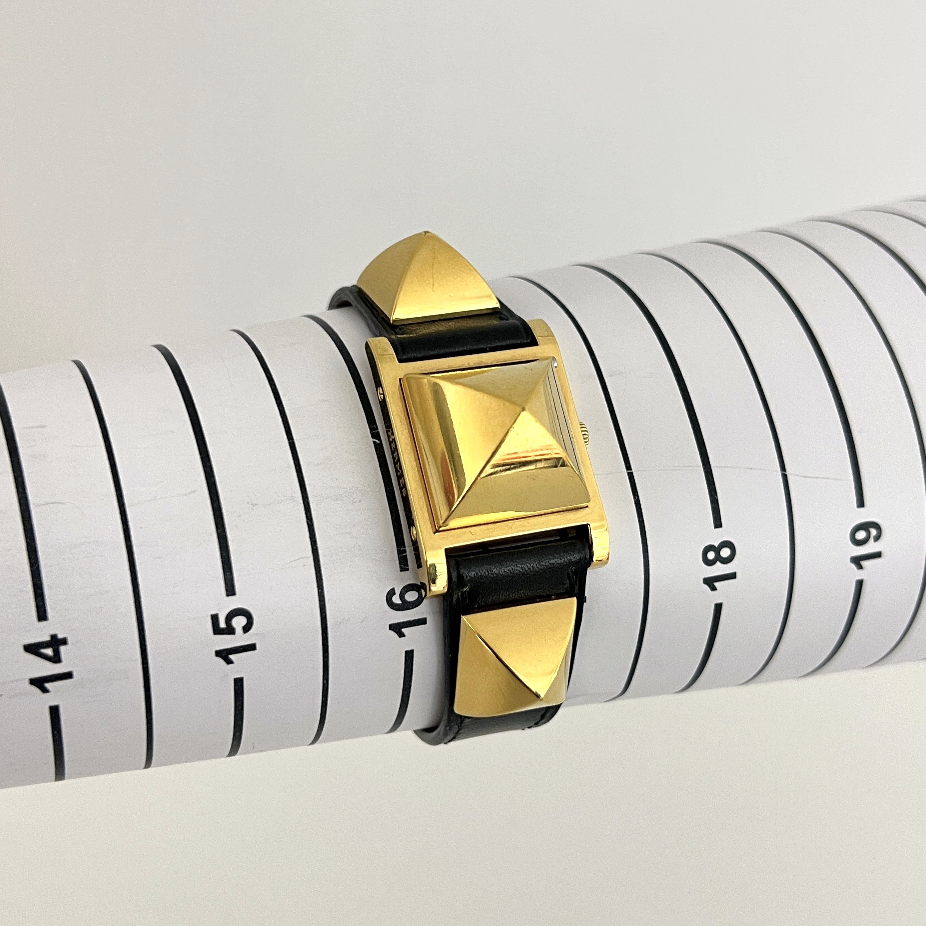 Montre HERMÈS Médor plaquée or dorée