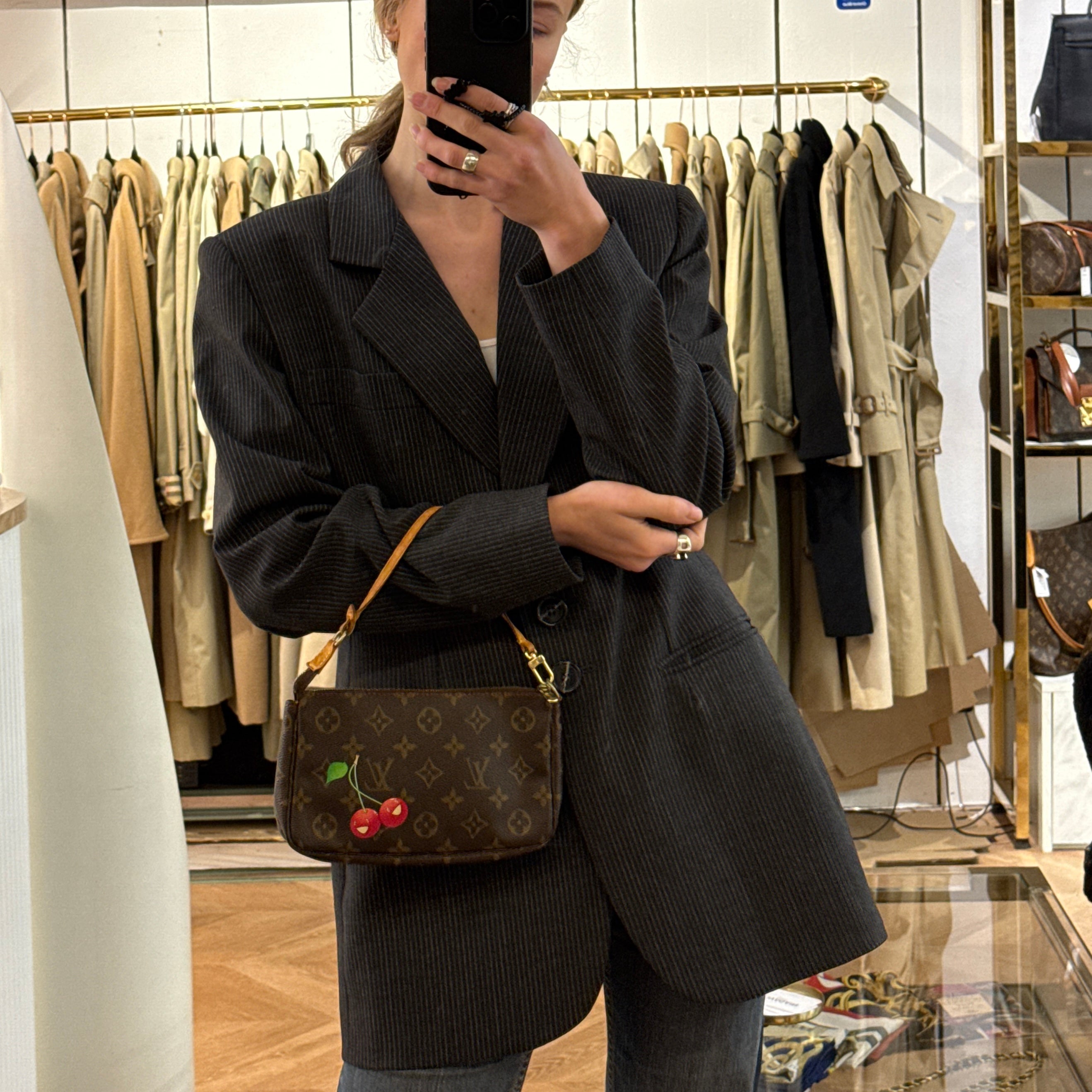 LOUIS VUITTON Pochette Accessoires handbag in brown canvas and leather