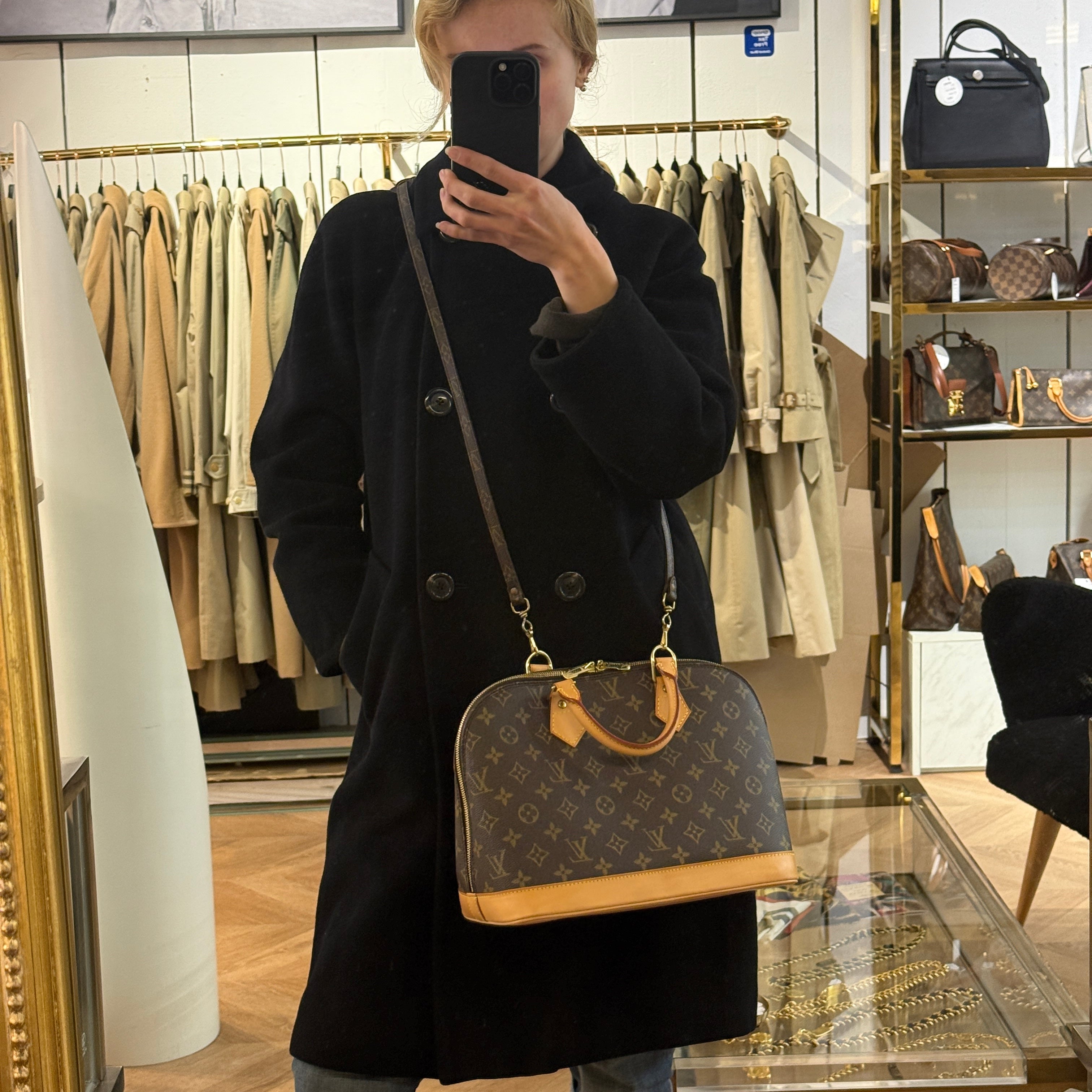LOUIS VUITTON Alma PM handbag in brown canvas and leather