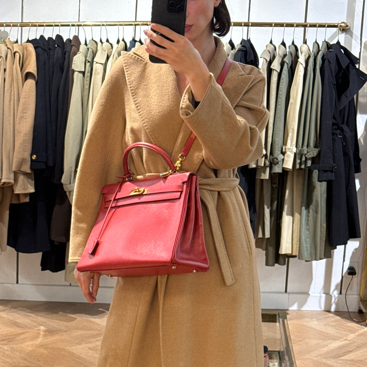 HERMÈS Kelly 35 shoulder bag in red grained leather, retourne style