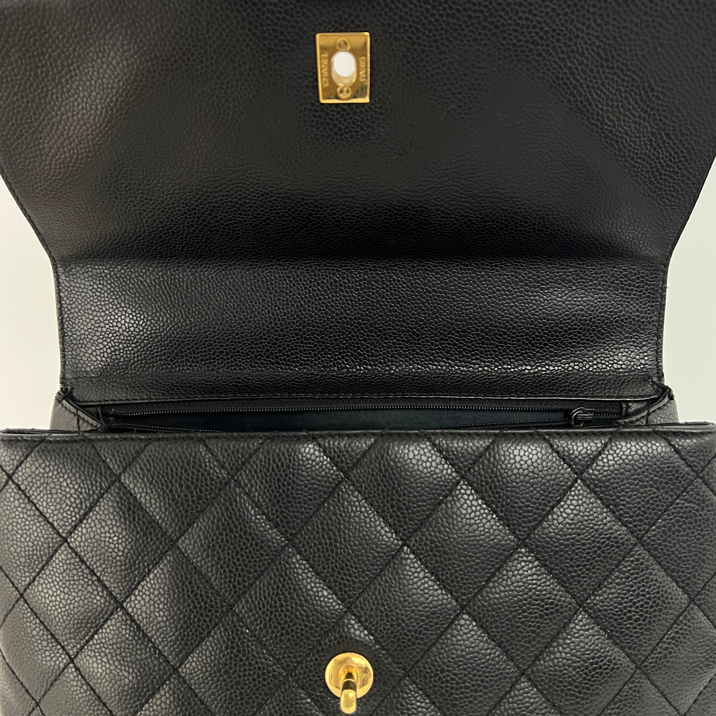 CHANEL Top Handle handbag in black caviar leather
