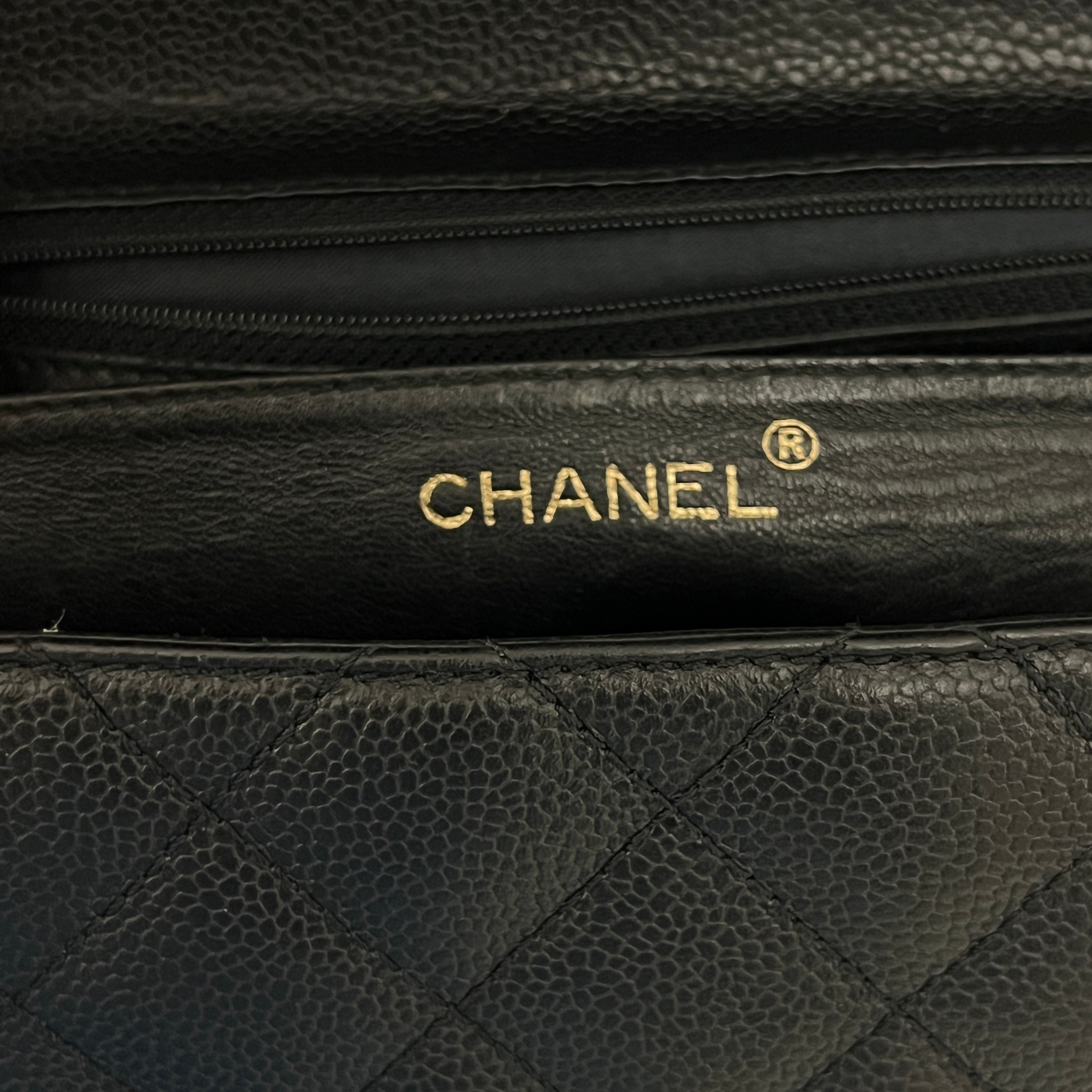 CHANEL Top Handle handbag in black caviar leather