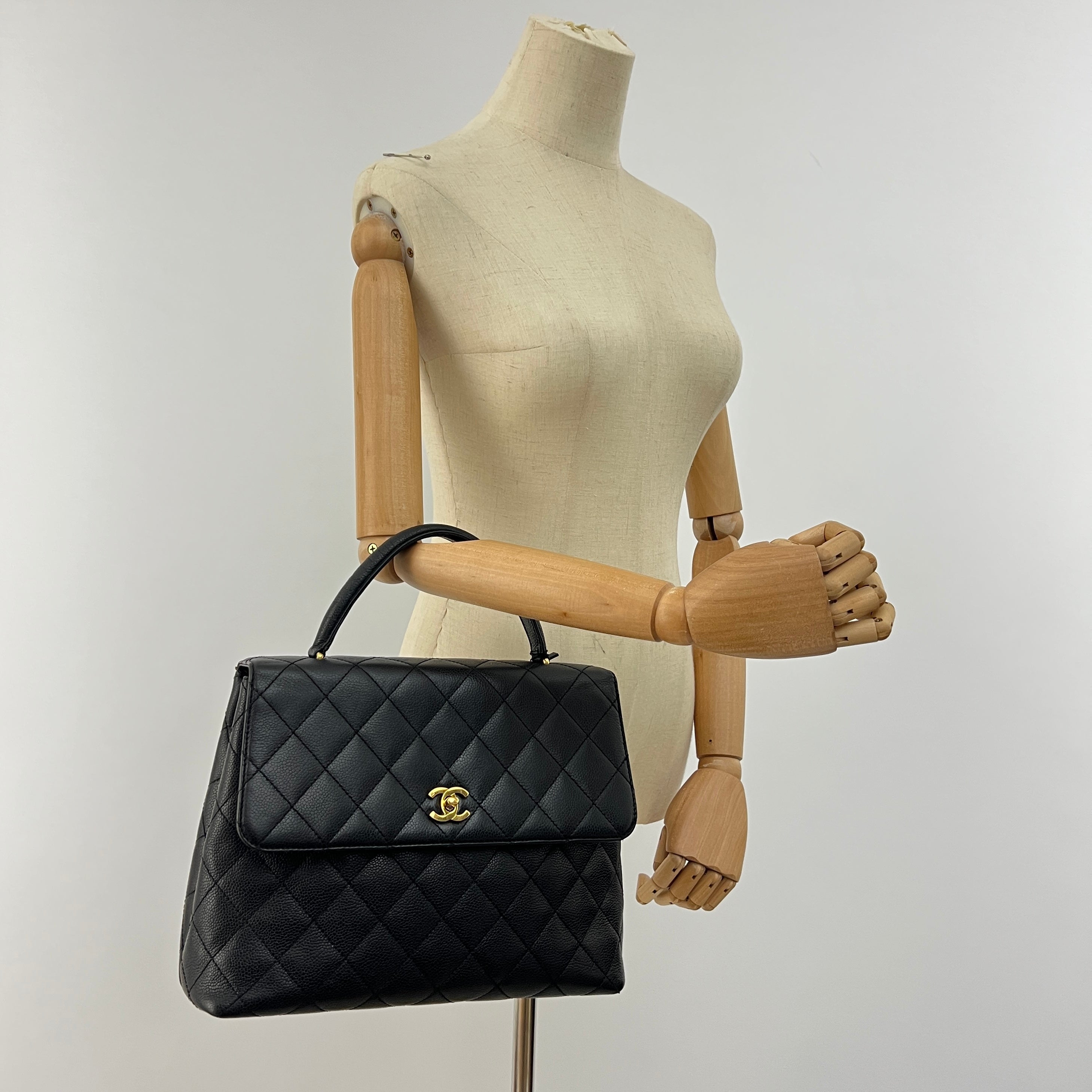 CHANEL Top Handle handbag in black caviar leather