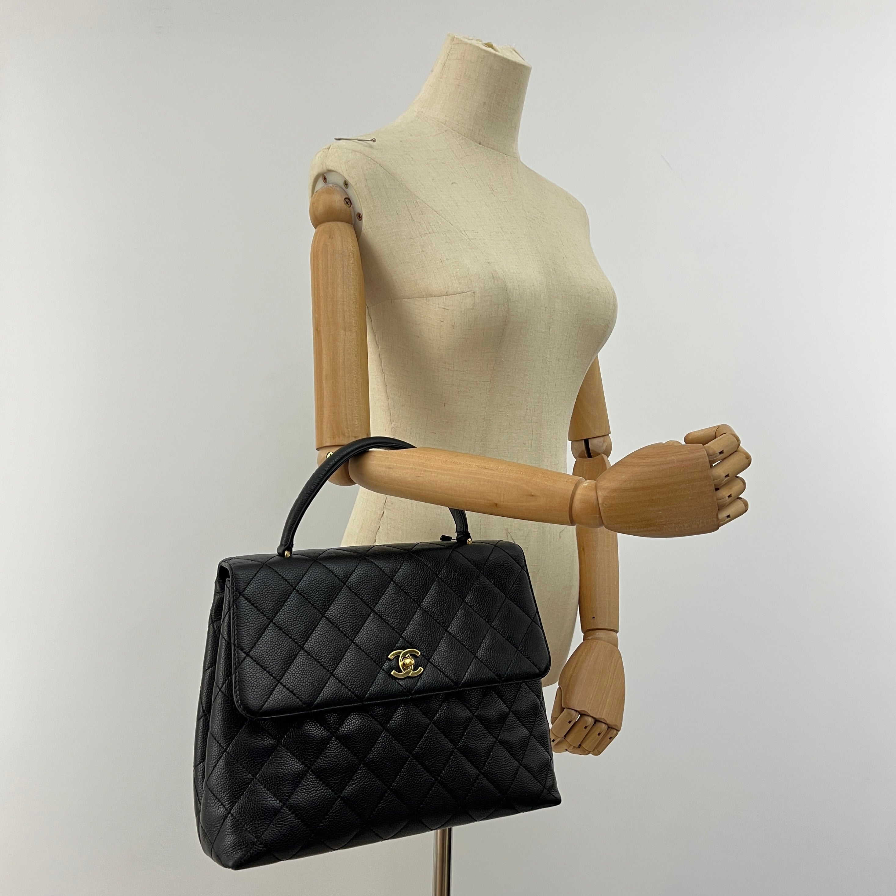 Sac à main CHANEL Top Handle cuir caviar noir