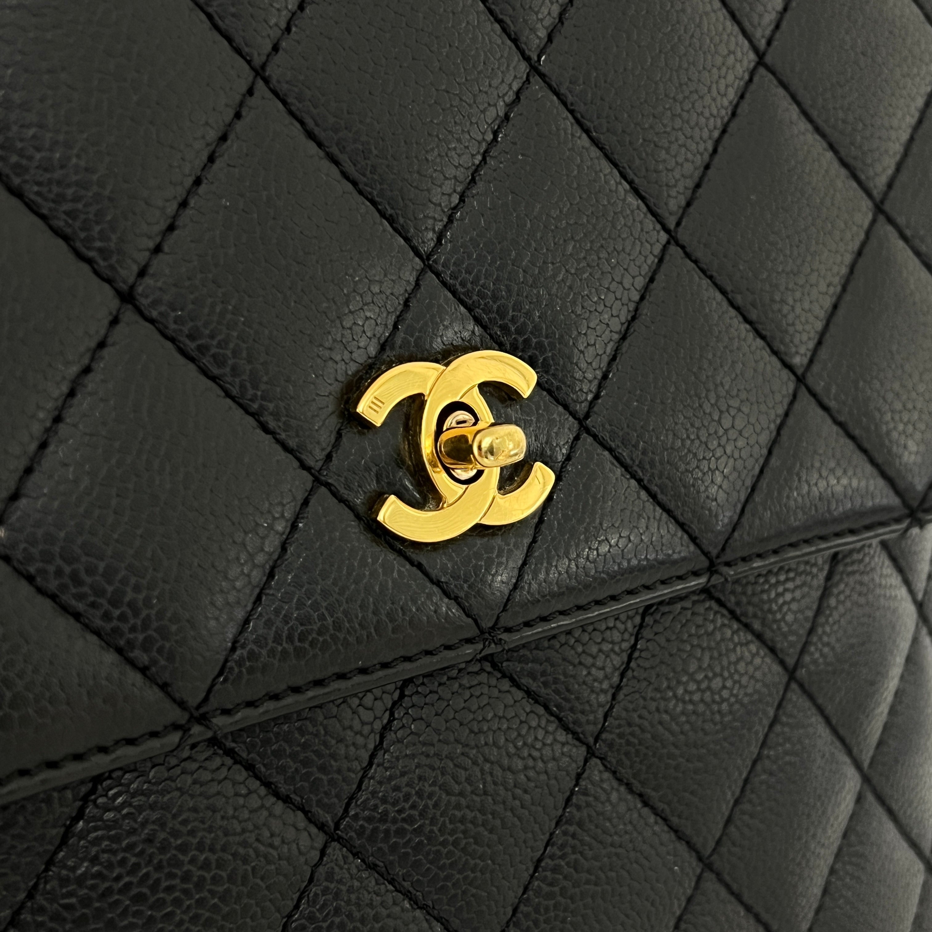 CHANEL Top Handle handbag in black caviar leather