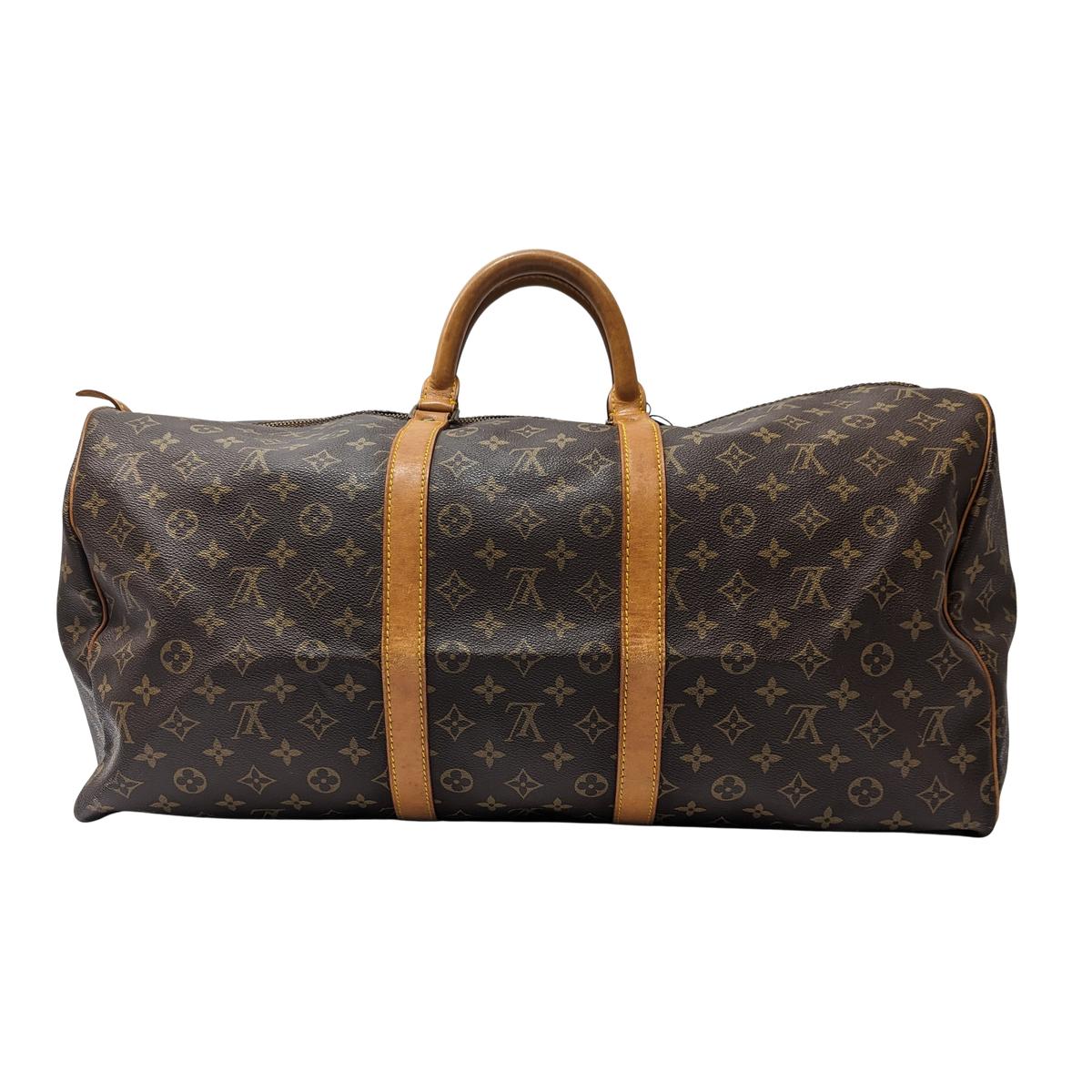 LOUIS VUITTON Keepall 55 canvas and leather travel bag Brown S072425