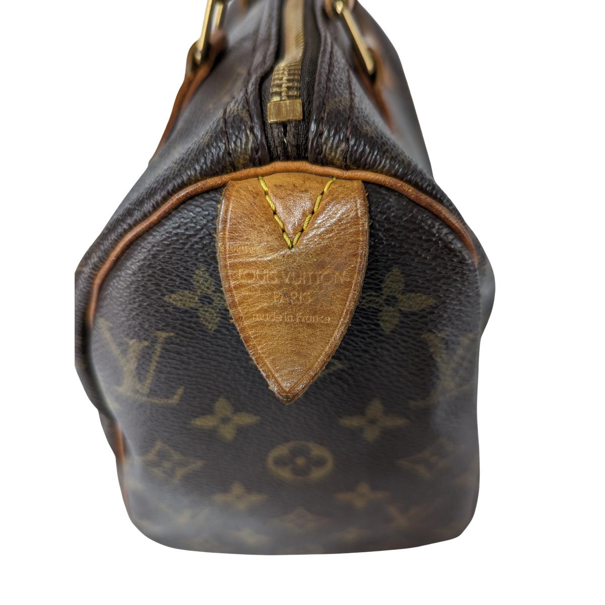 LOUIS VUITTON Speedy 25 canvas and leather handbag Brown