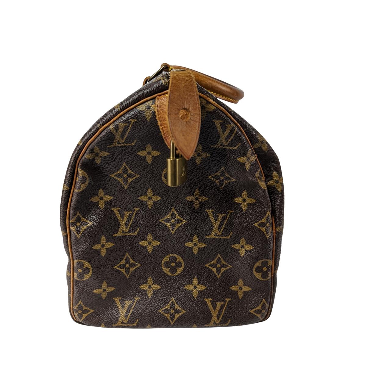 LOUIS VUITTON Speedy 30 canvas and leather handbag Brown