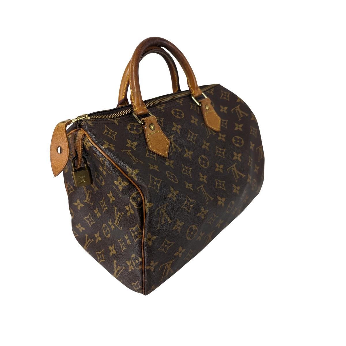 LOUIS VUITTON Speedy 30 canvas and leather handbag Brown