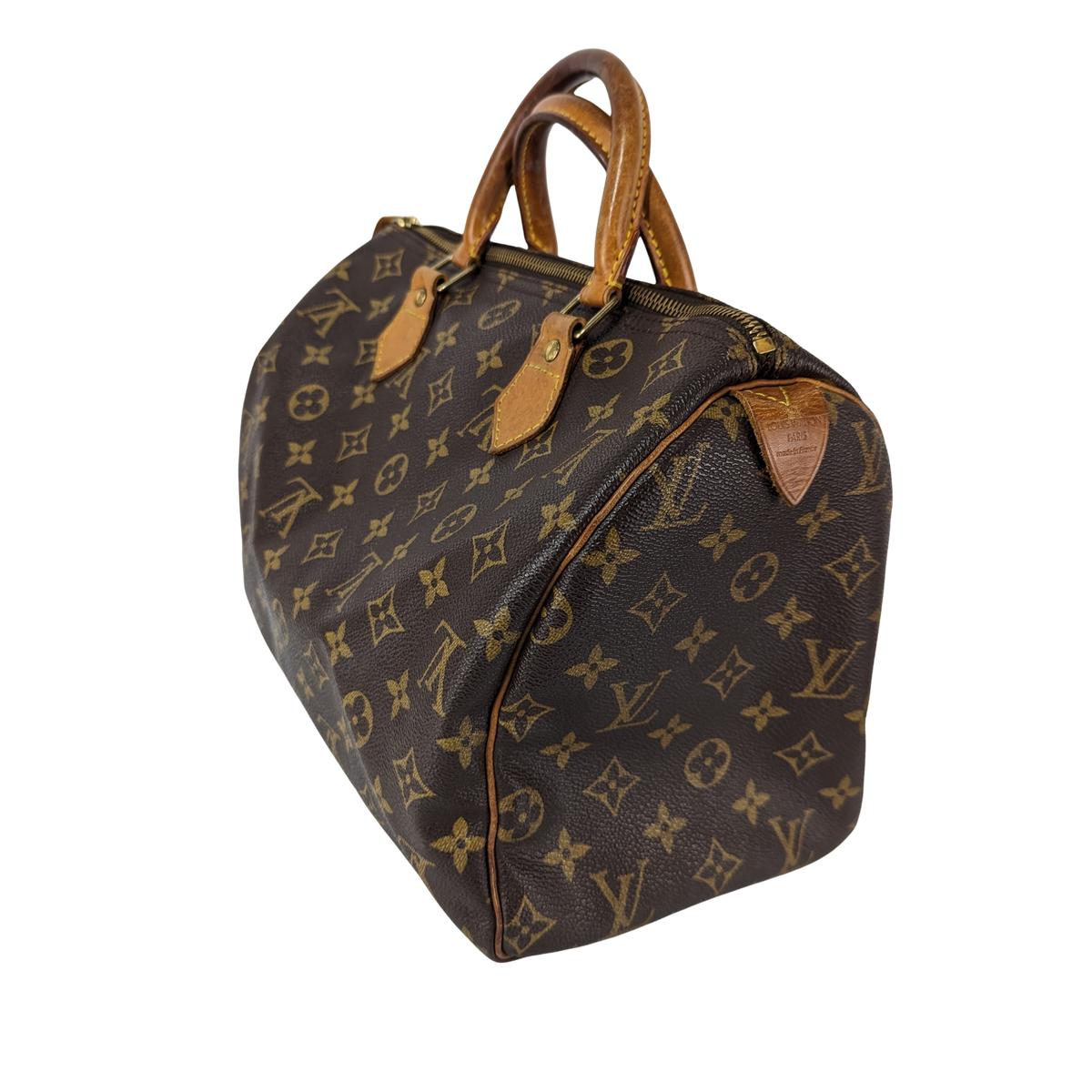 LOUIS VUITTON Speedy 30 canvas and leather handbag Brown