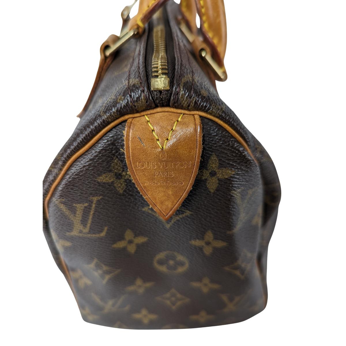 LOUIS VUITTON Speedy 25 canvas and leather handbag Brown