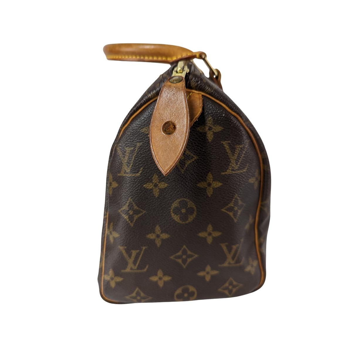 LOUIS VUITTON Speedy 25 canvas and leather handbag Brown