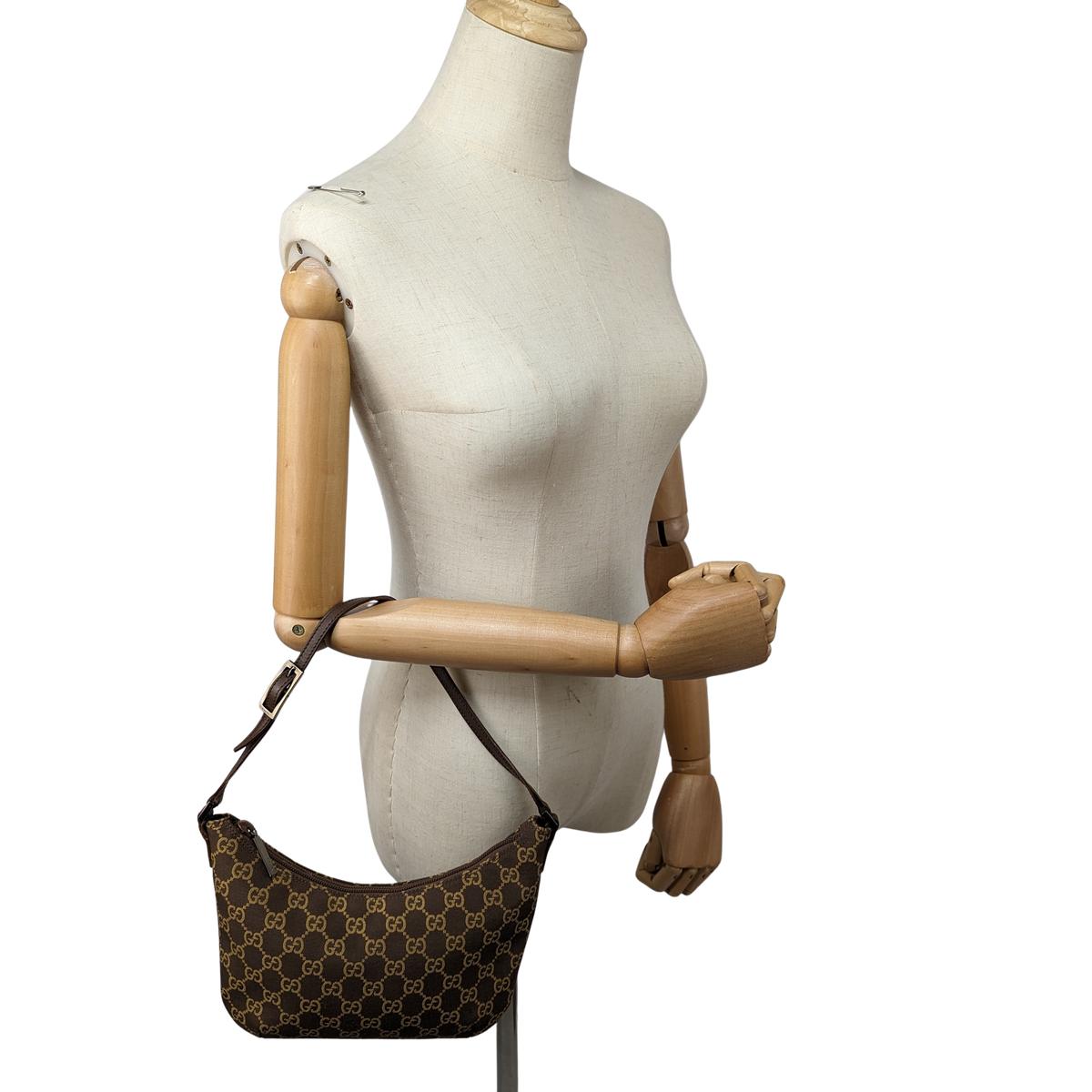 GUCCI Hobo accessory pouch canvas and leather Brown handbag