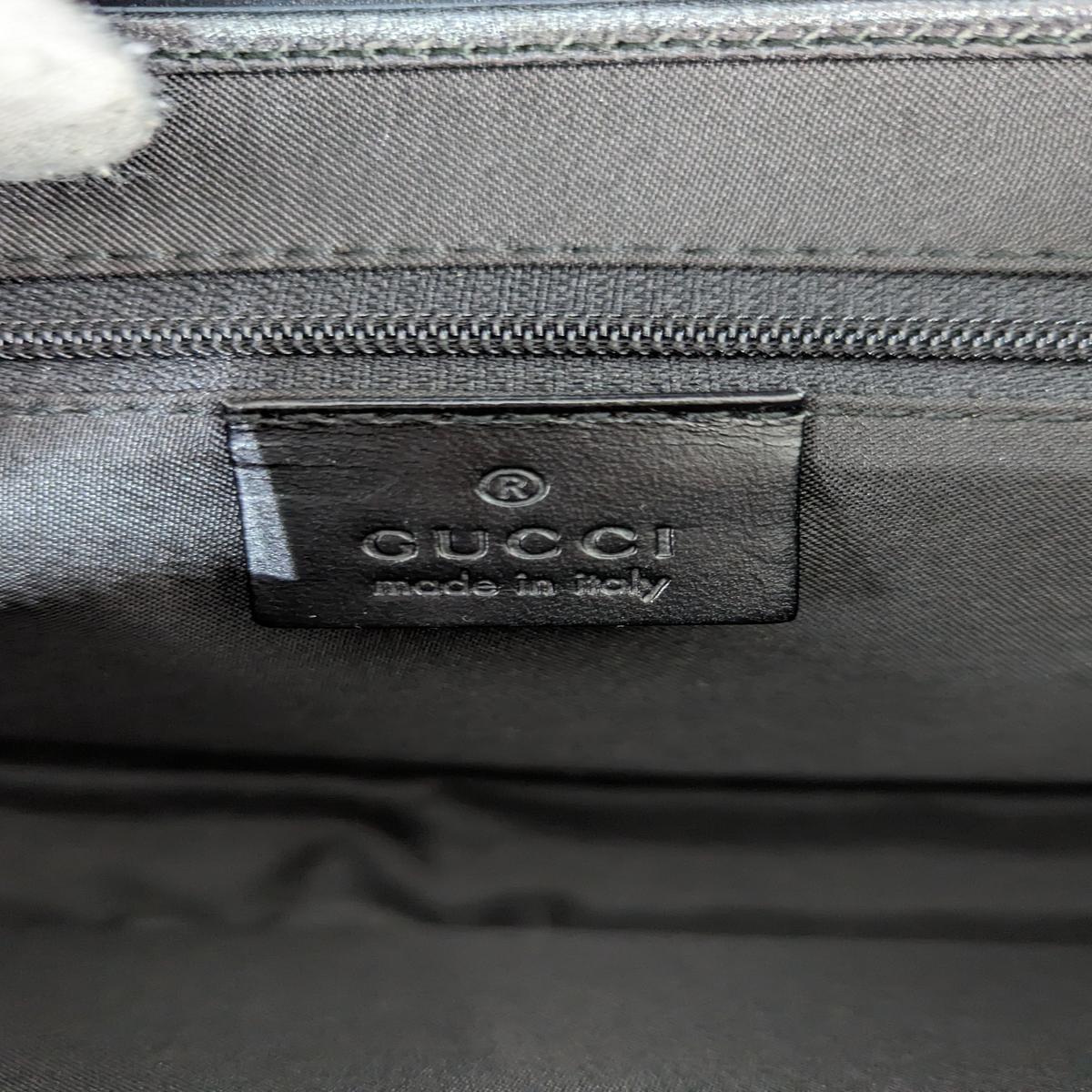 GUCCI Jackie pm canvas and leather handbag Black